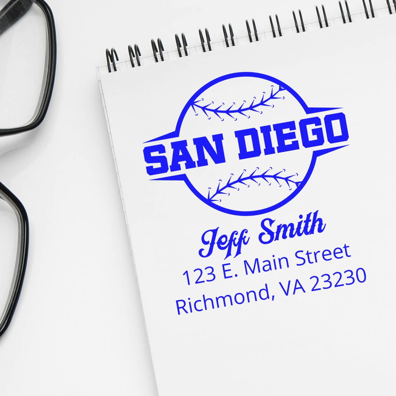 Custom San Diego baseball rubber stamp mockup with Jeff Smith name and Richmond, VA address on a notebook