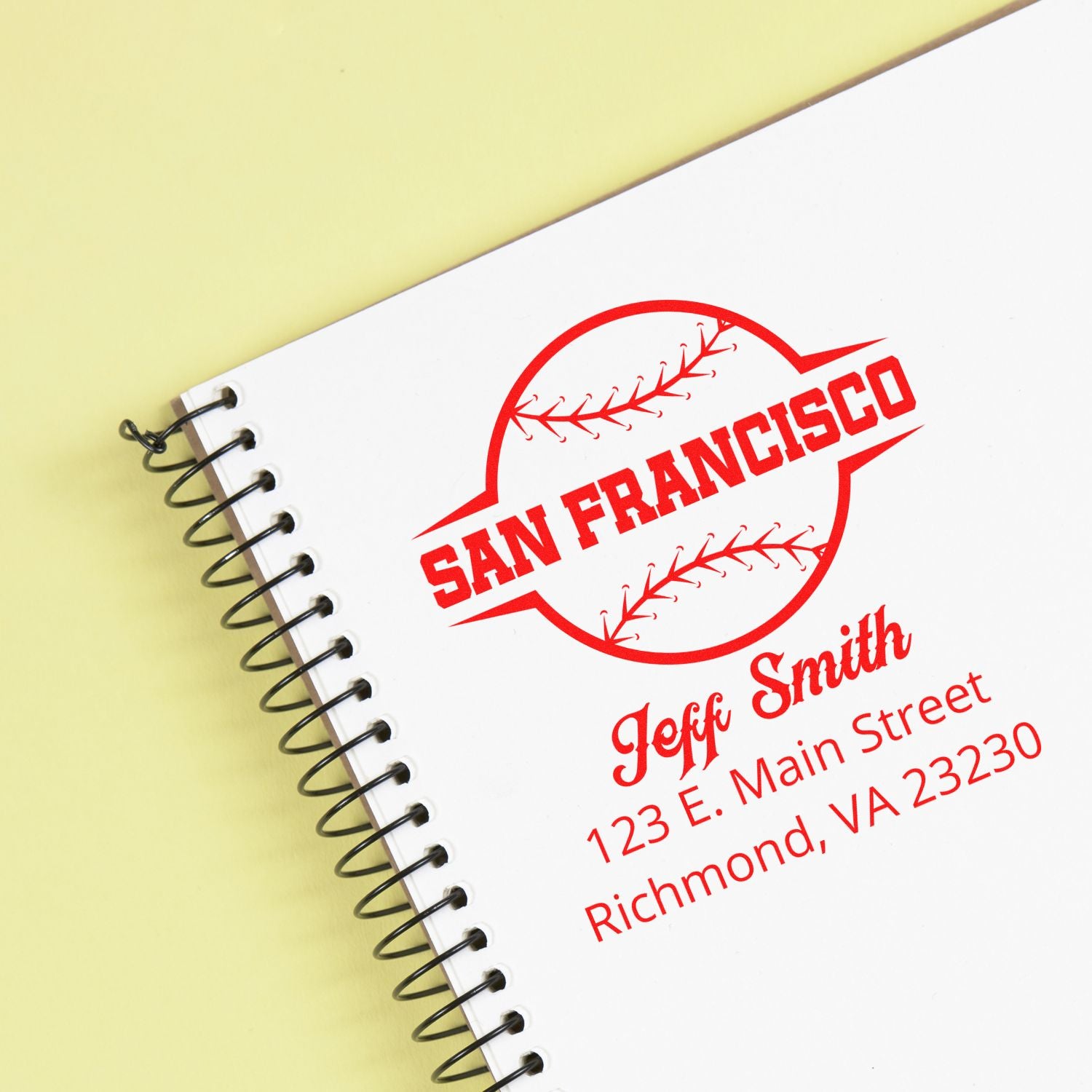 Custom San Francisco baseball address rubber stamp for Jeff Smith on a notebook, featuring name and Richmond, VA address.