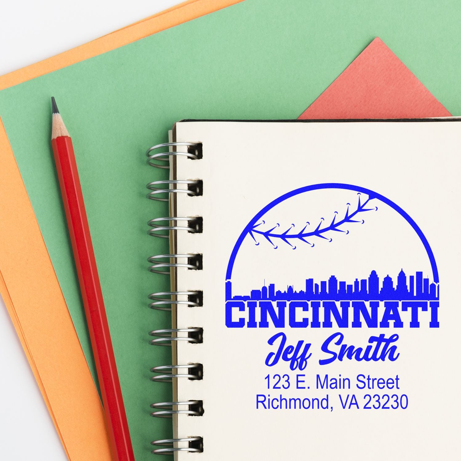 Personalized Cincinnati return address rubber stamp with Jeff Smith and Richmond, VA address on a notebook.