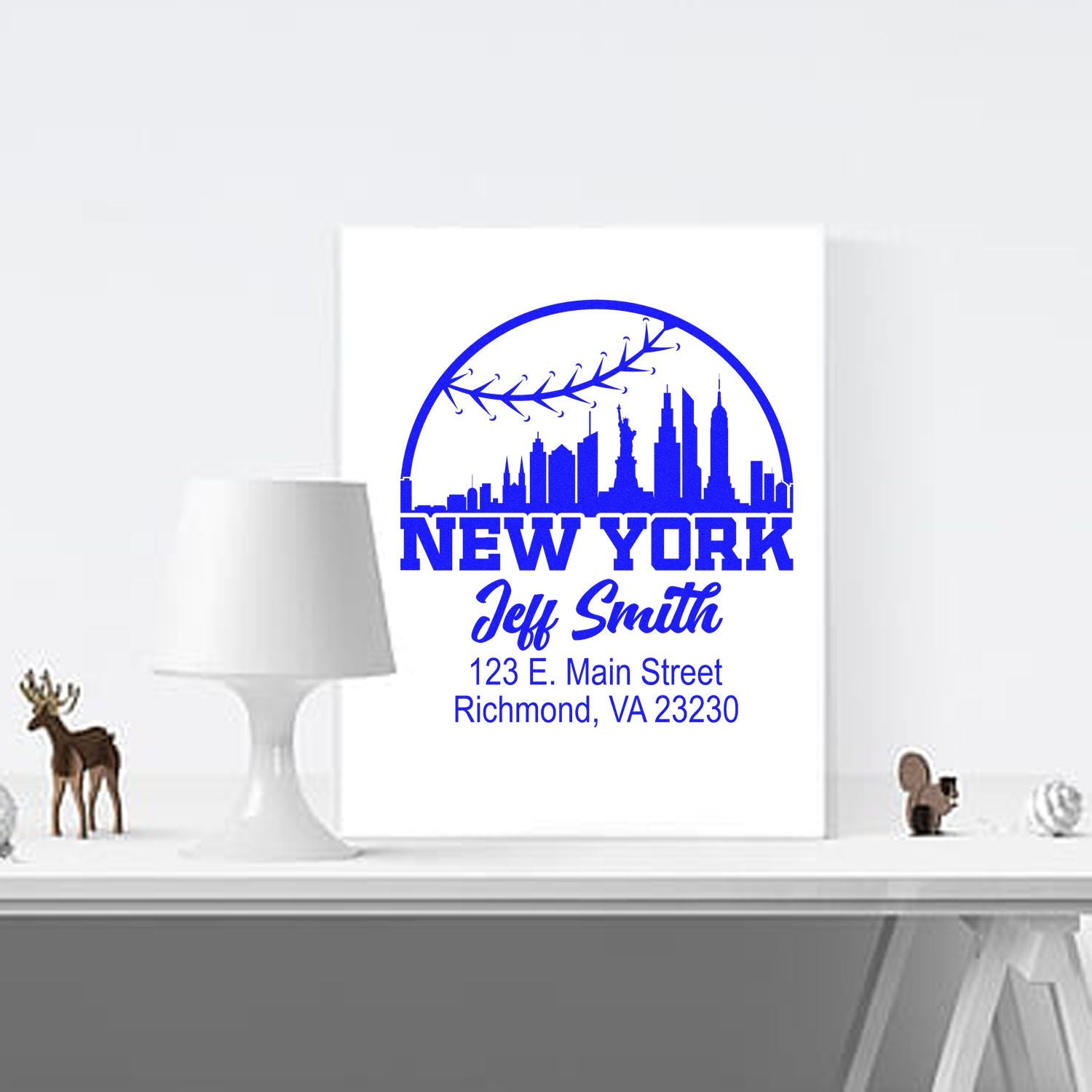 Custom New York rubber stamp with skyline, name, and address for personalized return address or business branding use.