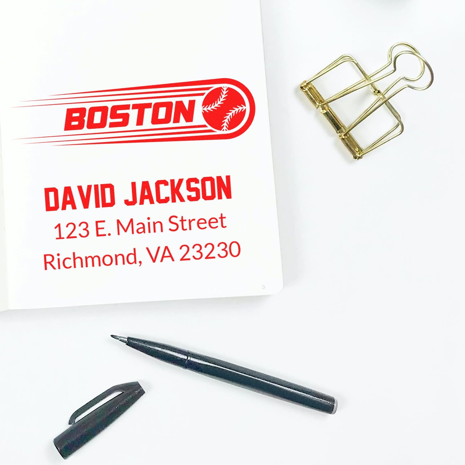 Custom rubber stamp proof showing Boston baseball logo, name, and address for personalized business mailings.