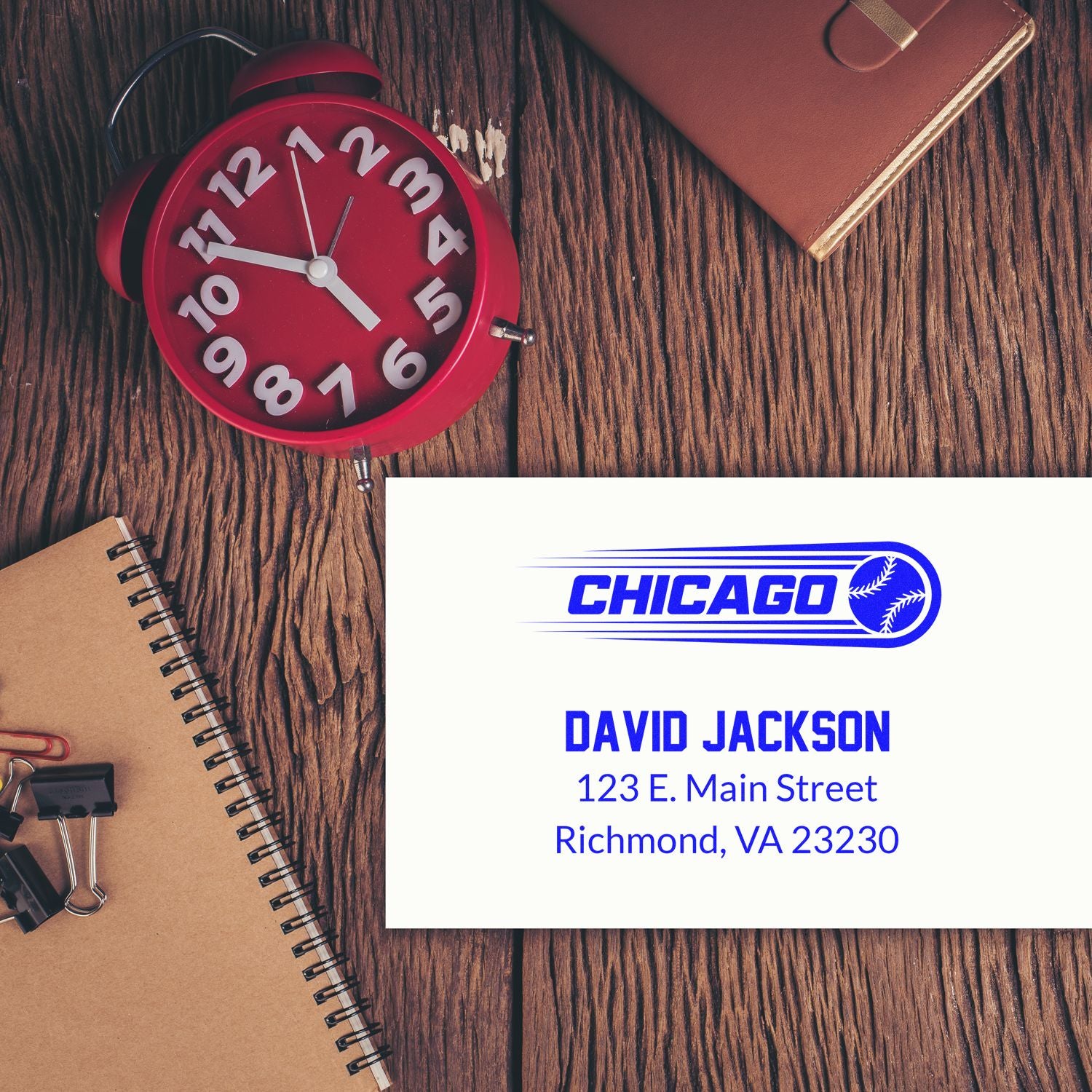 Personalized rubber stamp mockup with Chicago logo, name, and address for business mail