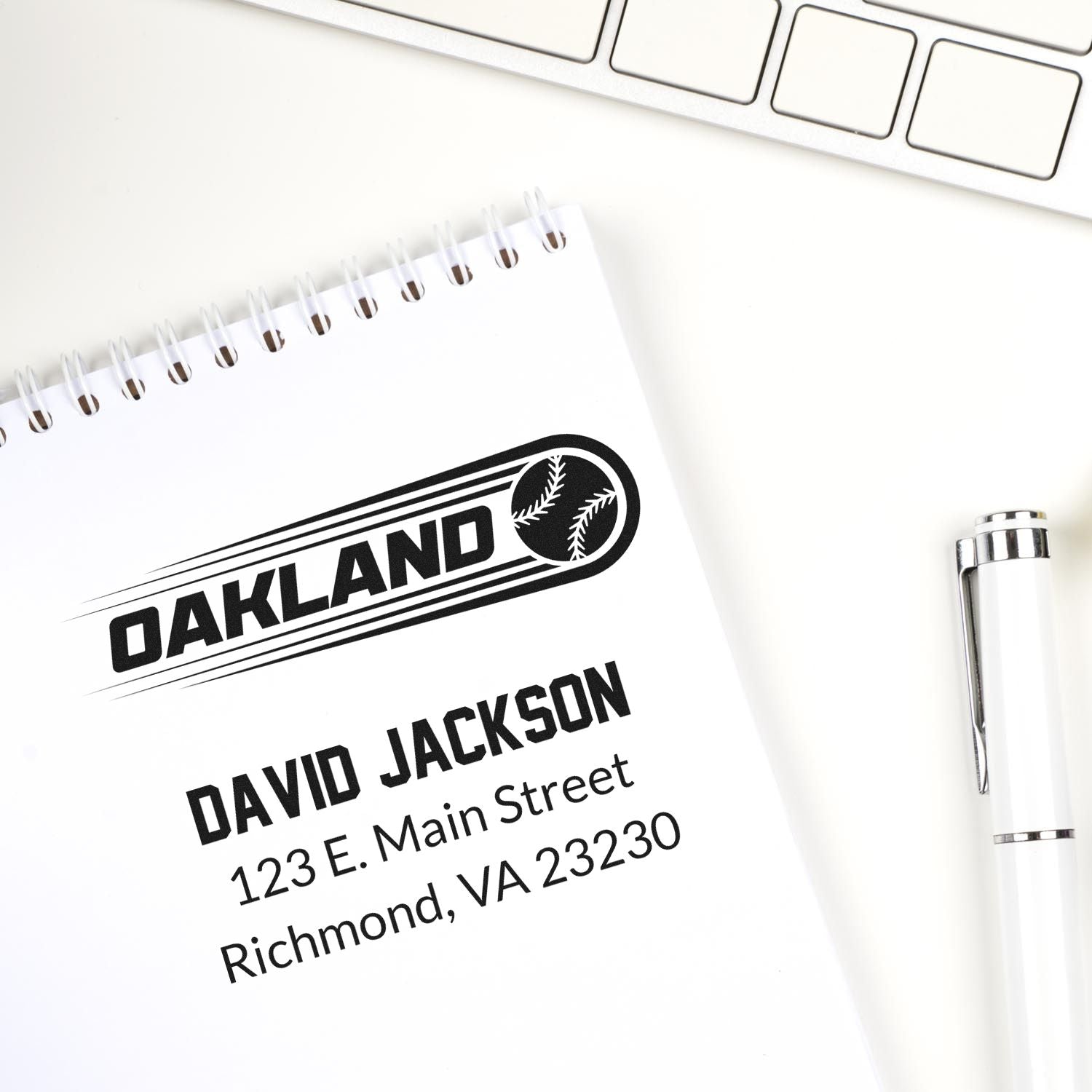 Custom rubber stamp design for Oakland address labels with David Jackson name, street address, and baseball icon.
