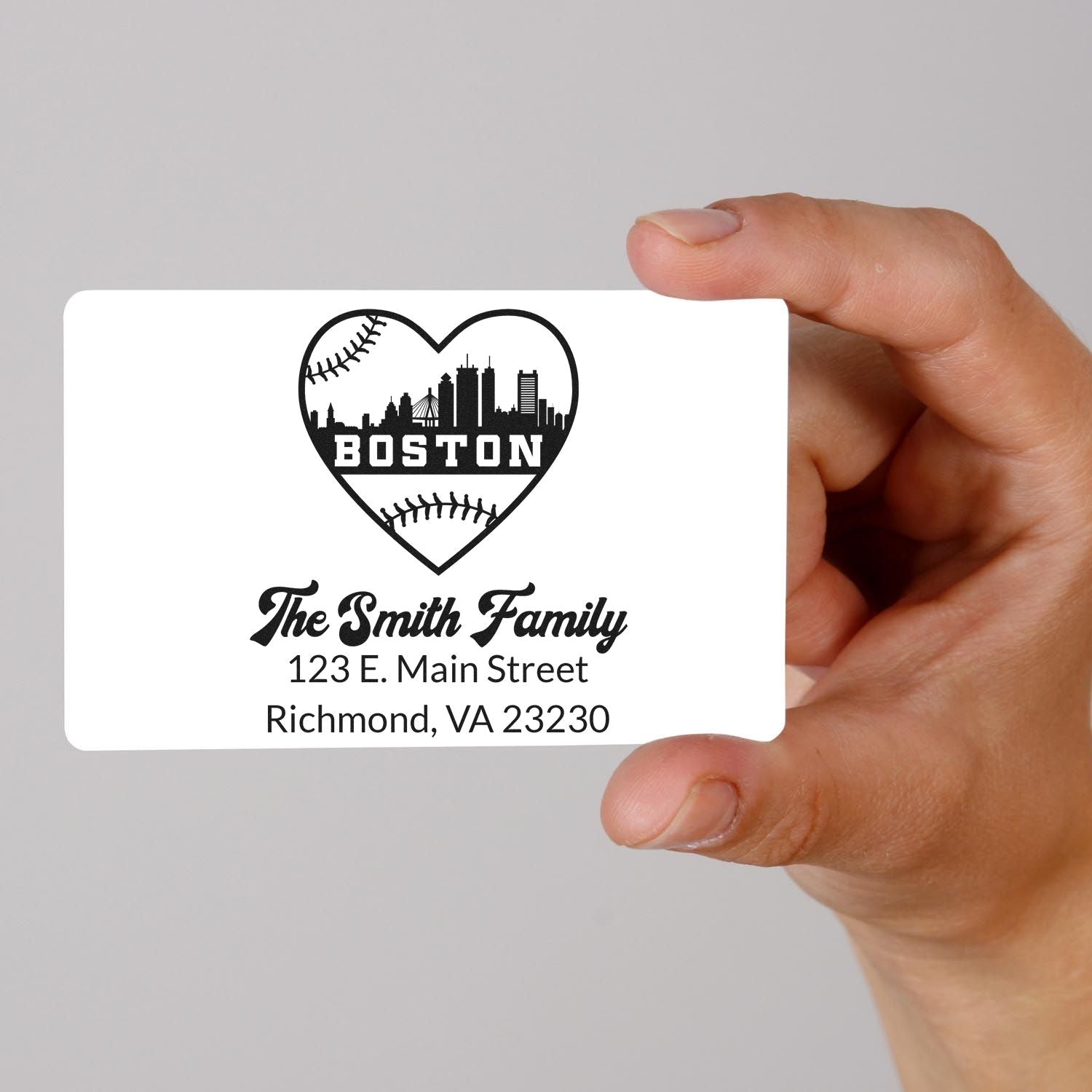 Custom rubber stamp design with Boston heart skyline, baseball seams, and Smith Family return address for personalized mailing.