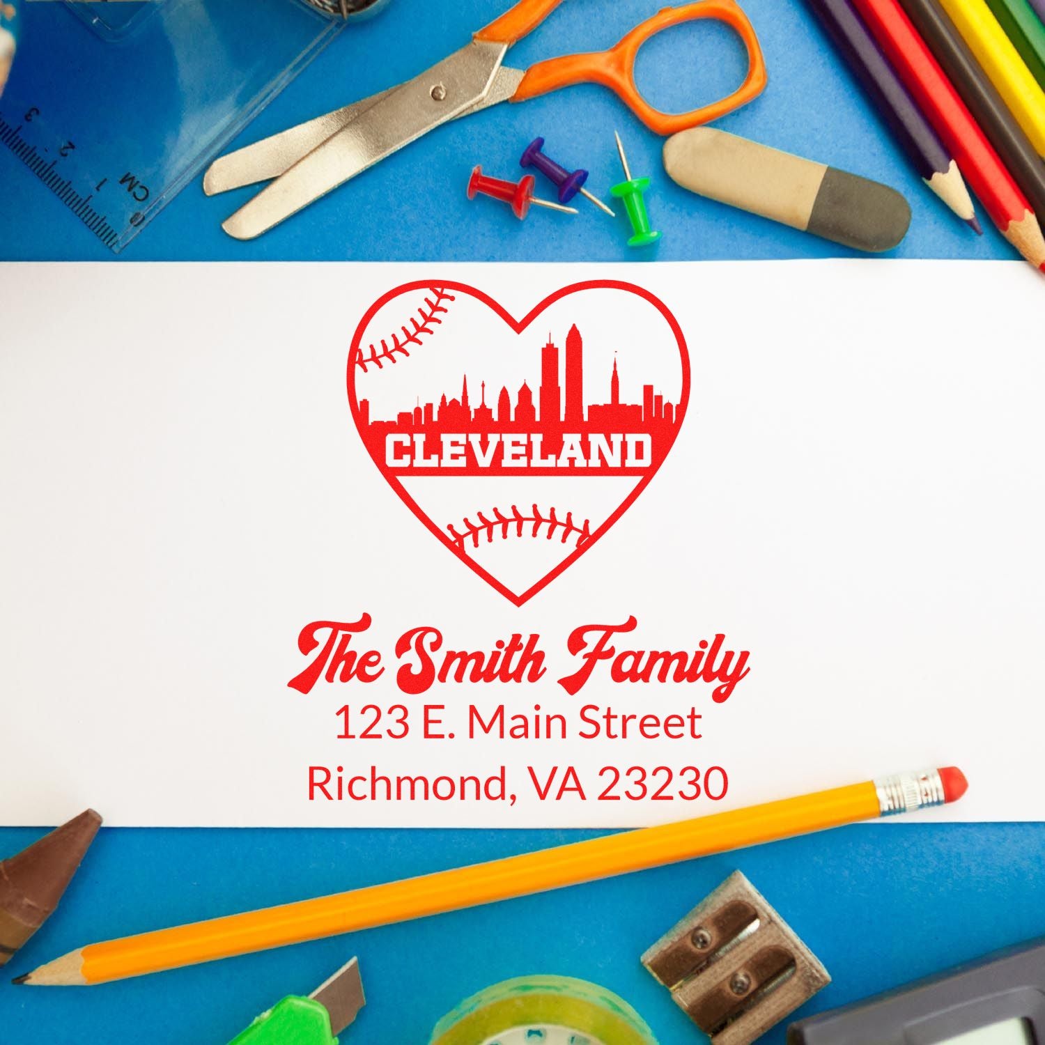 Personalized rubber stamp with Cleveland baseball heart, Smith family name, and address for stationery or packaging.