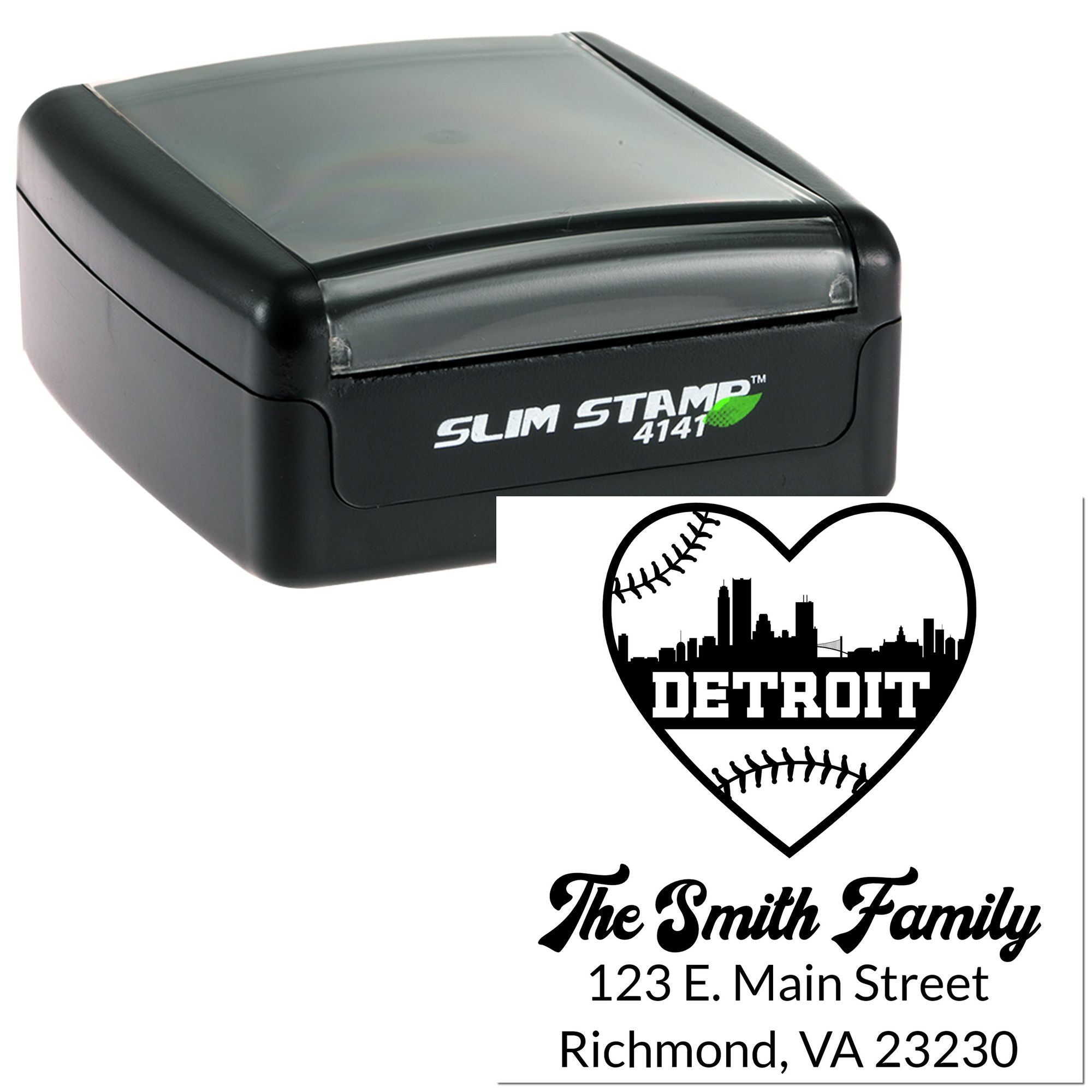 Custom self-inking return address rubber stamp with Detroit heart design, family name, and address imprint.
