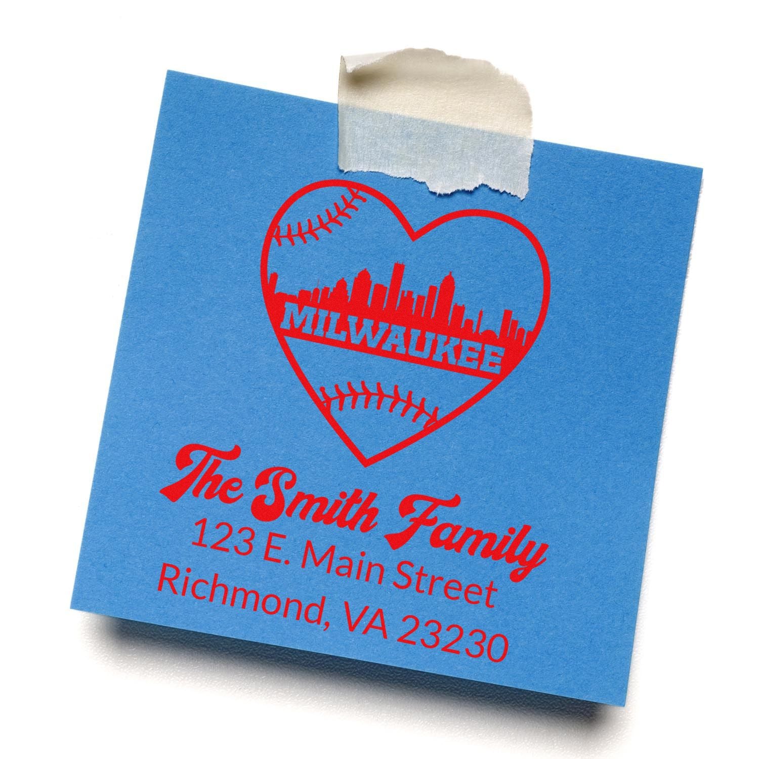 Custom rubber stamp on blue card with Milwaukee baseball heart design, family name, and return address.