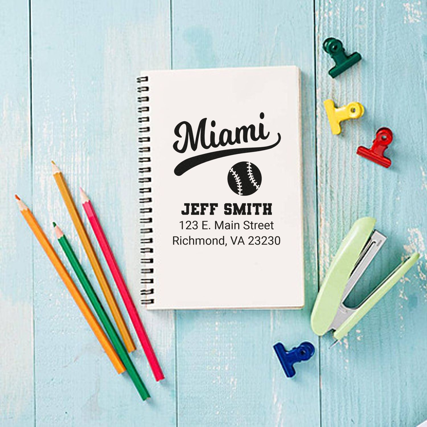 Custom baseball return address rubber stamp with Miami design, Jeff Smith name, and mailing address on notebook