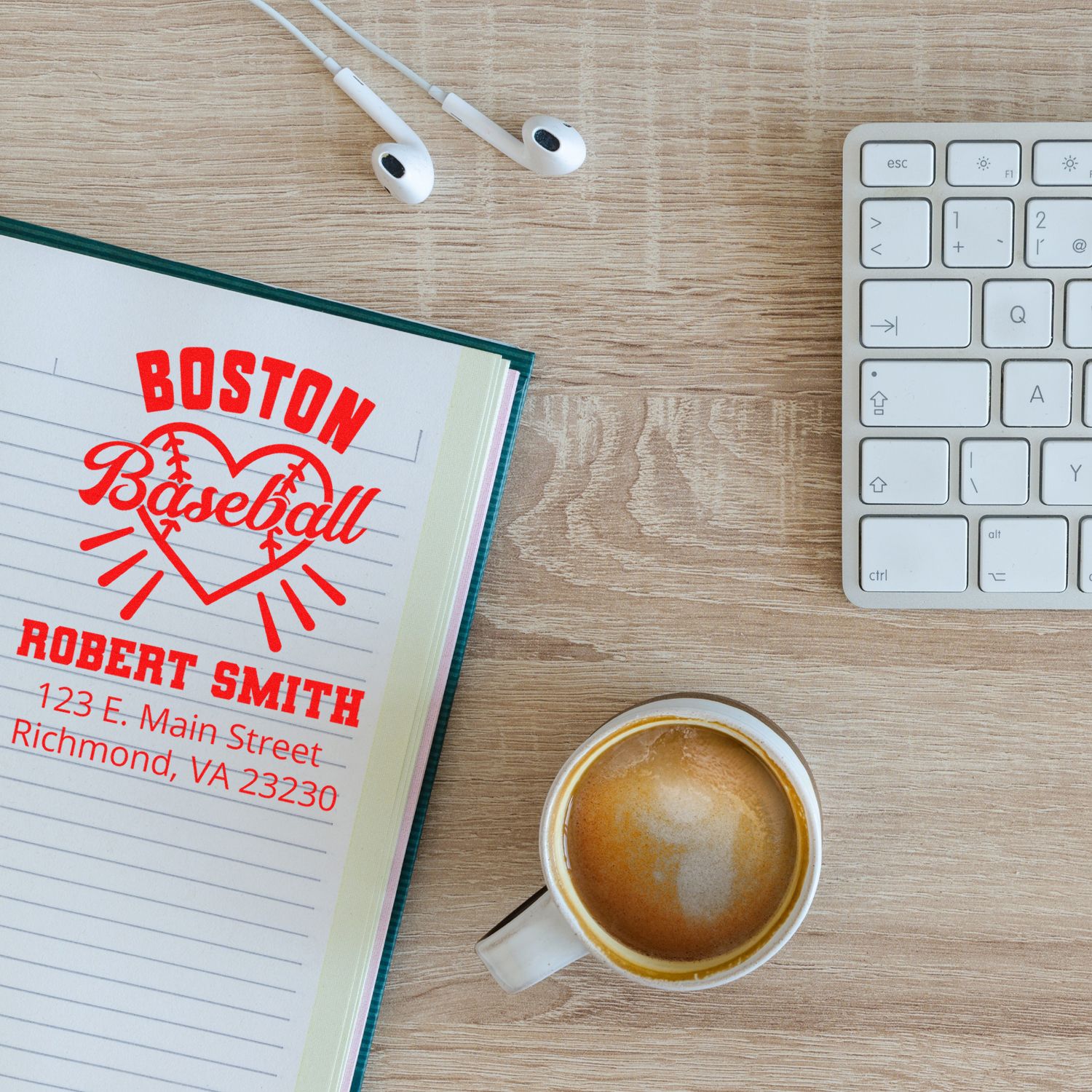 Custom baseball rubber stamp imprint with Boston design, name, and address in a notebook on a desk.