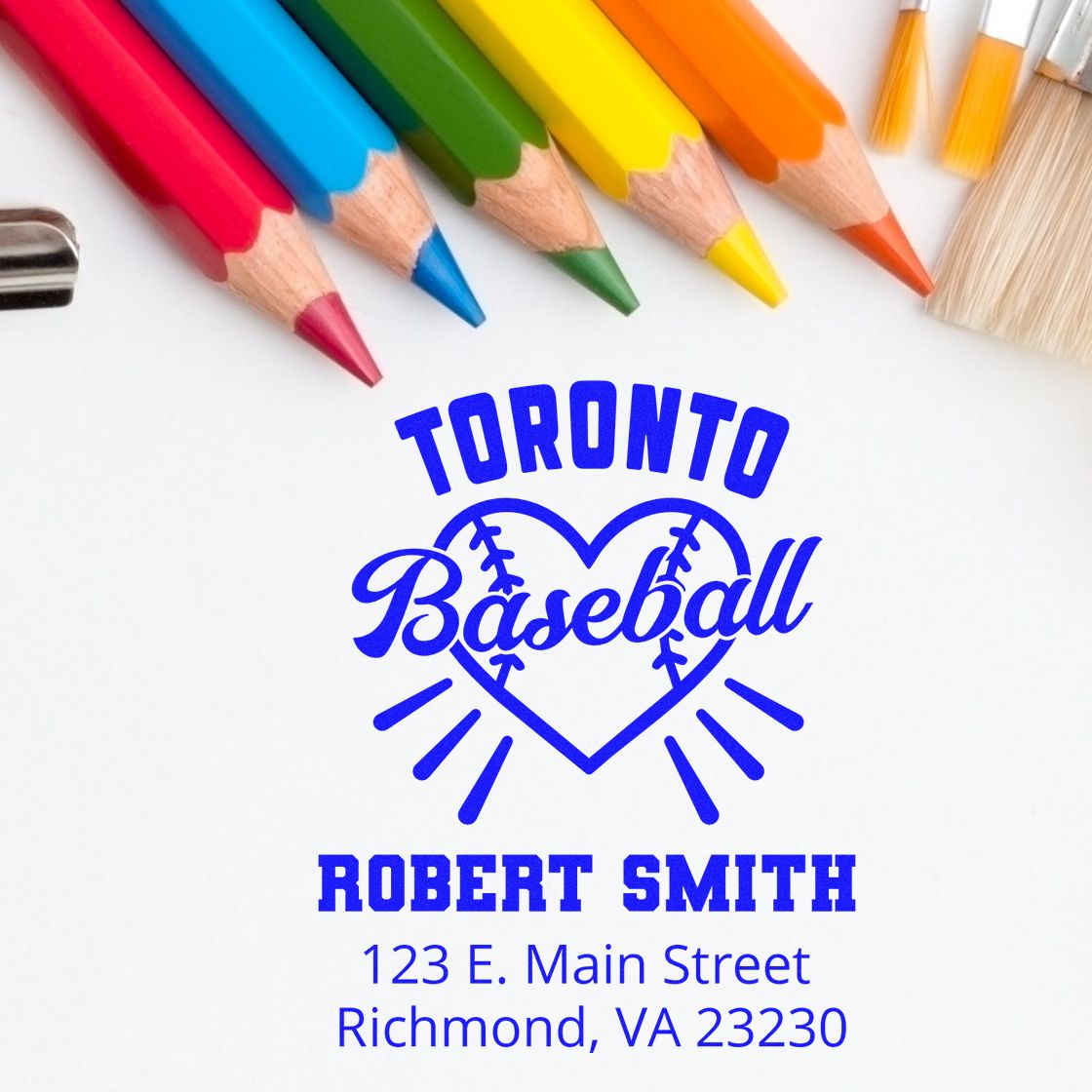 Custom baseball rubber stamp mockup for Toronto Baseball, featuring Robert Smith and address, with colored pencils for design proof