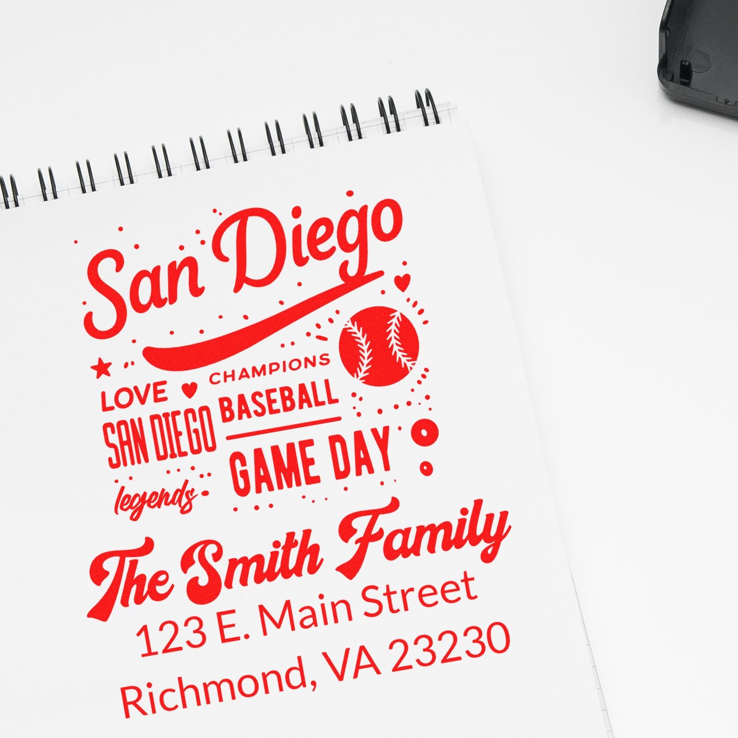 Custom San Diego baseball rubber stamp impression with family name, address, and game-day design for personalized stationery.