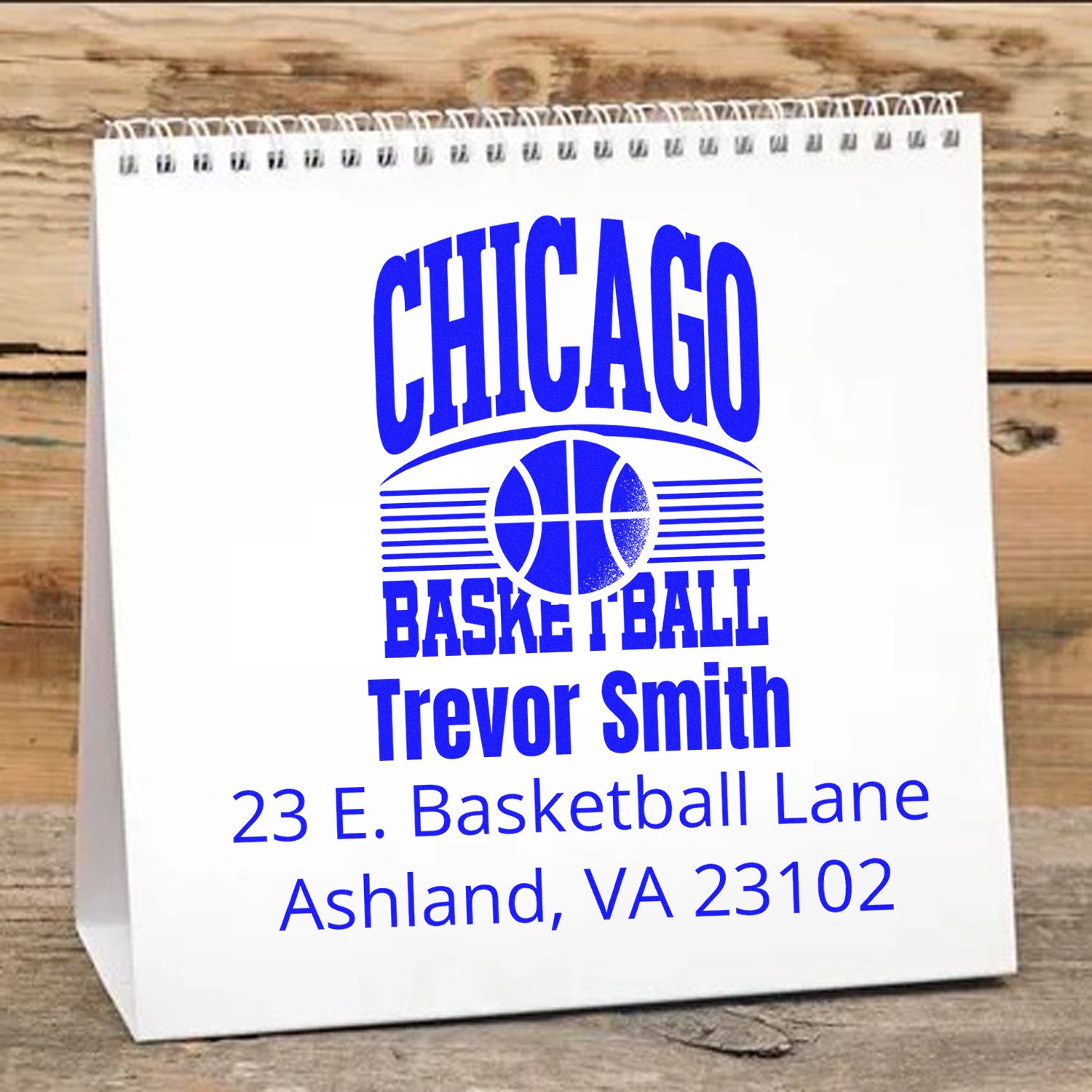 Custom Chicago basketball rubber stamp for Trevor Smith, personalized with name and Ashland, VA address for packaging.