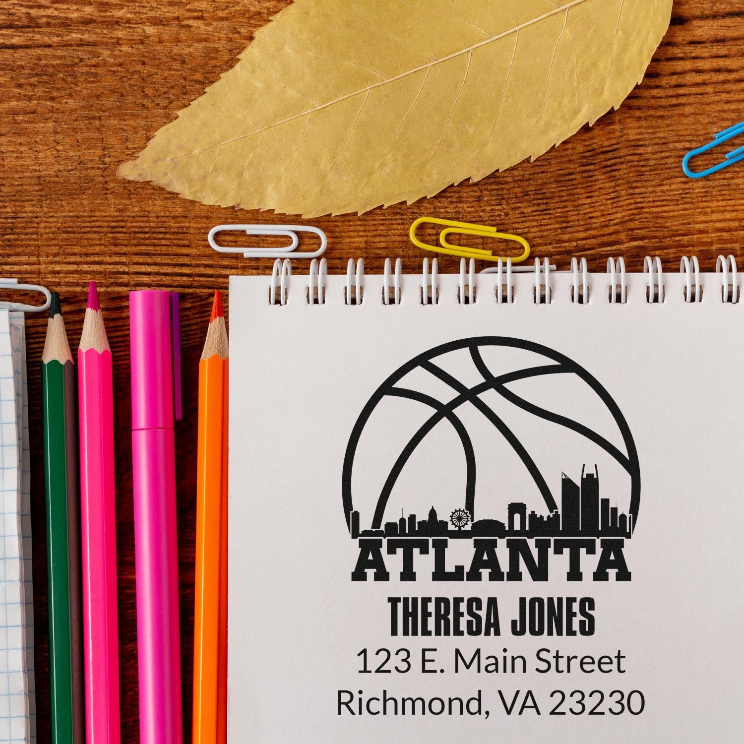 Personalized Atlanta rubber stamp design with name, address, and basketball skyline logo for Theresa Jones.