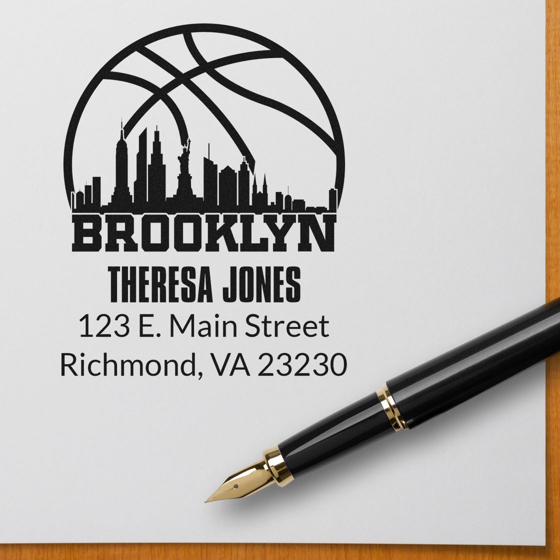 Personalized Brooklyn rubber stamp with skyline basketball logo, Theresa Jones name, and Richmond, VA return address.