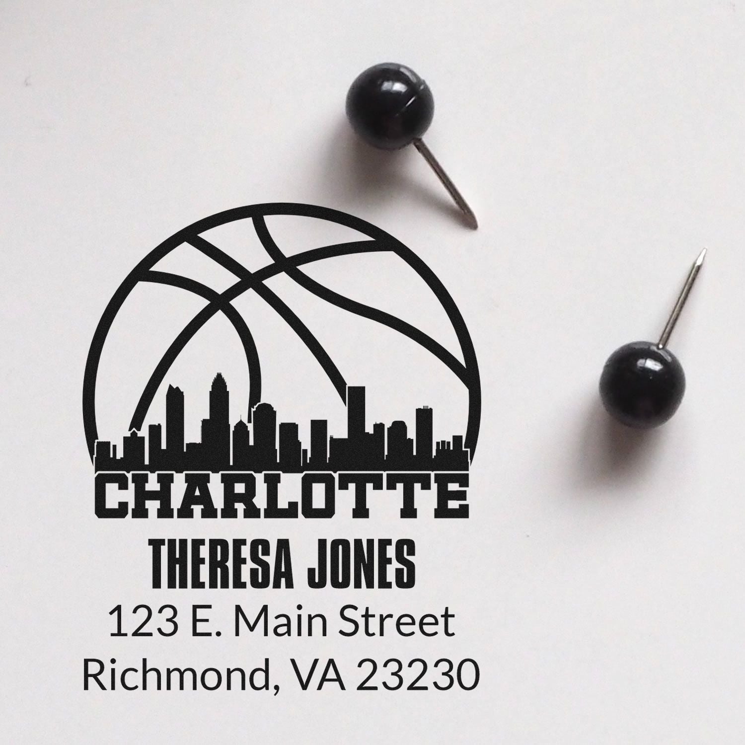 Custom return address rubber stamp with Charlotte skyline and basketball design for Theresa Jones, Richmond, VA 23230
