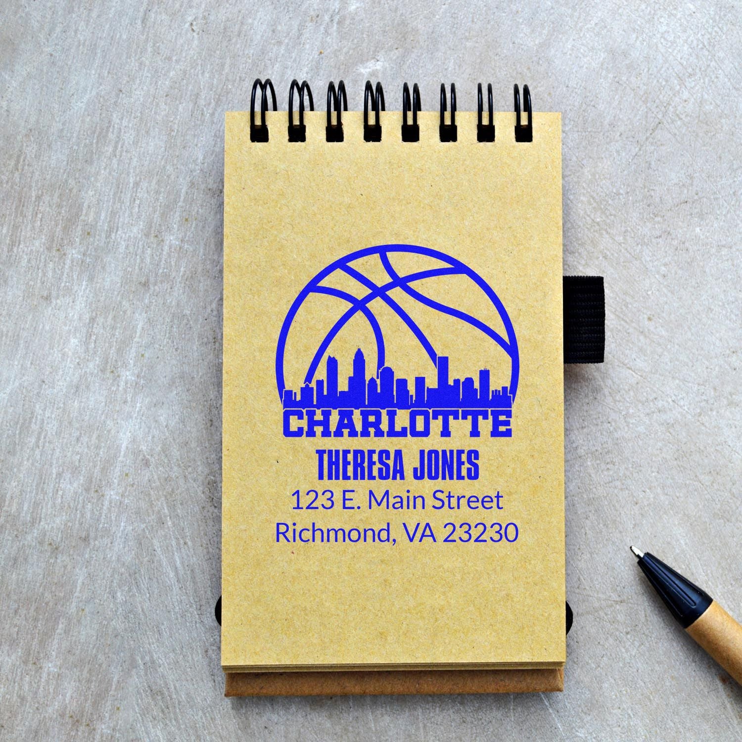 Custom Charlotte basketball address rubber stamp featuring skyline logo, Theresa Jones, Richmond VA 23230.