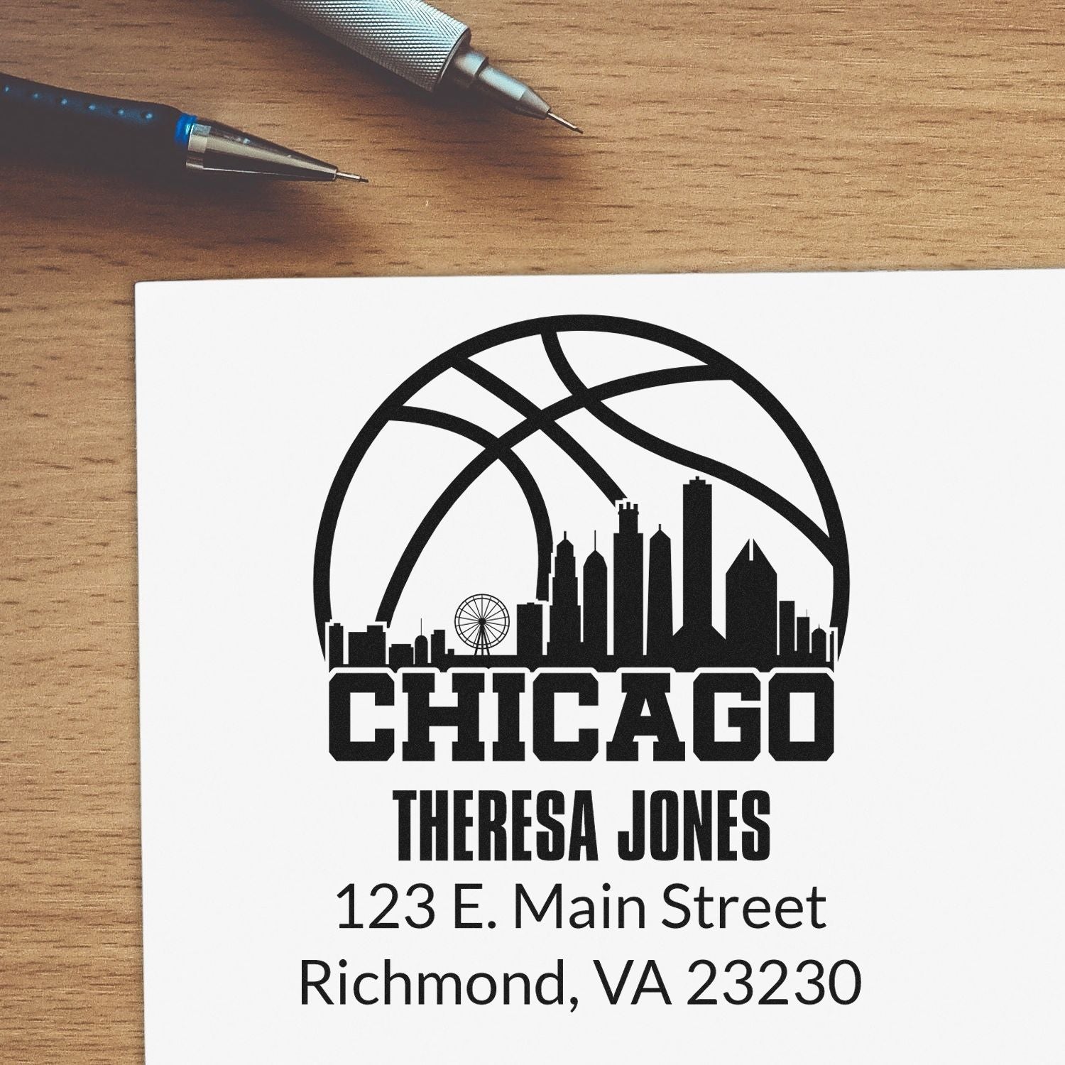 Custom Chicago return address rubber stamp with skyline design, personalized name, and mailing address for envelopes.