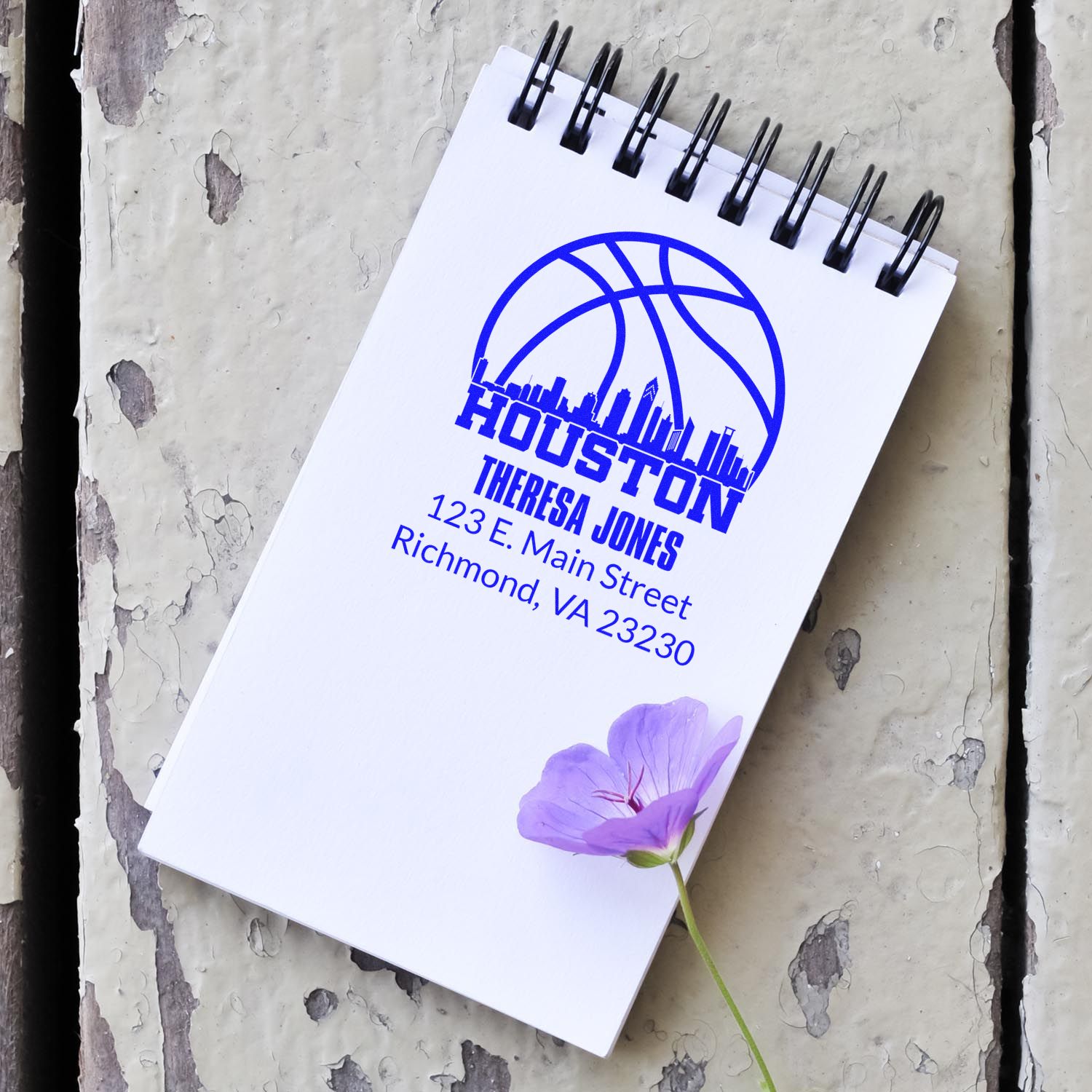 Custom Houston basketball rubber stamp with Theresa Jones name and Richmond, VA address on a notebook.