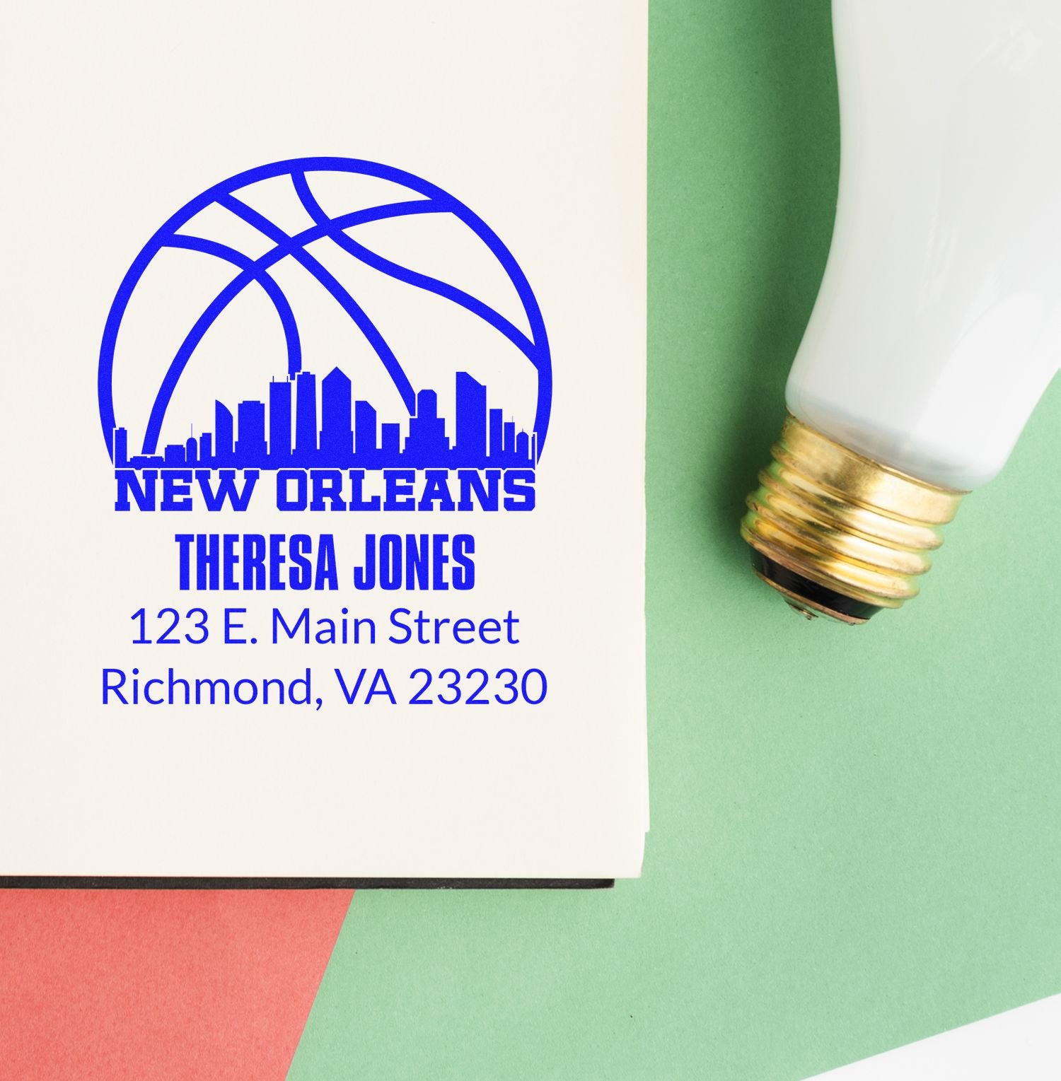 Custom return address rubber stamp for Theresa Jones, featuring New Orleans skyline and Richmond, VA mailing address.