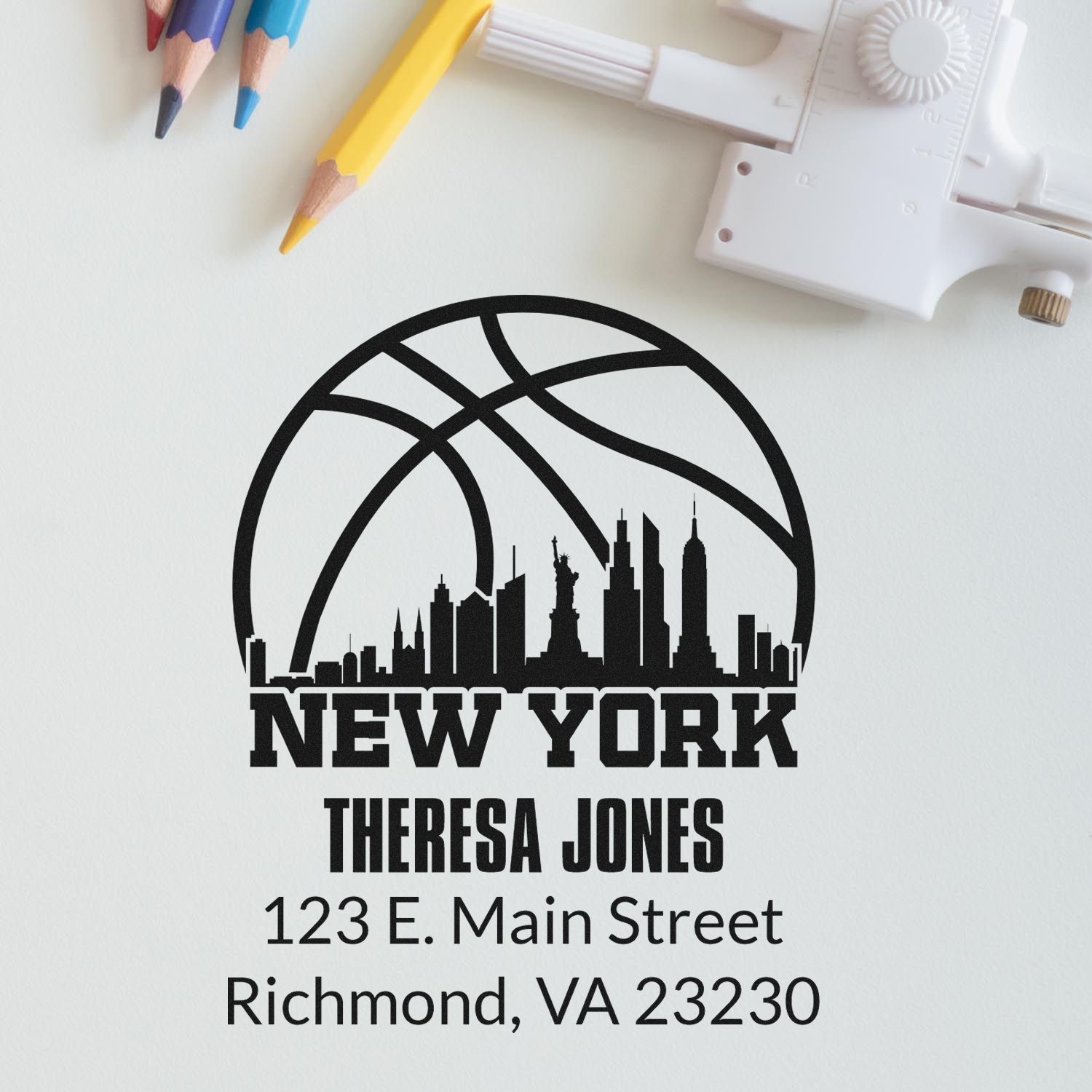 Custom New York skyline address rubber stamp with personalized name and mailing address for envelopes and packaging.