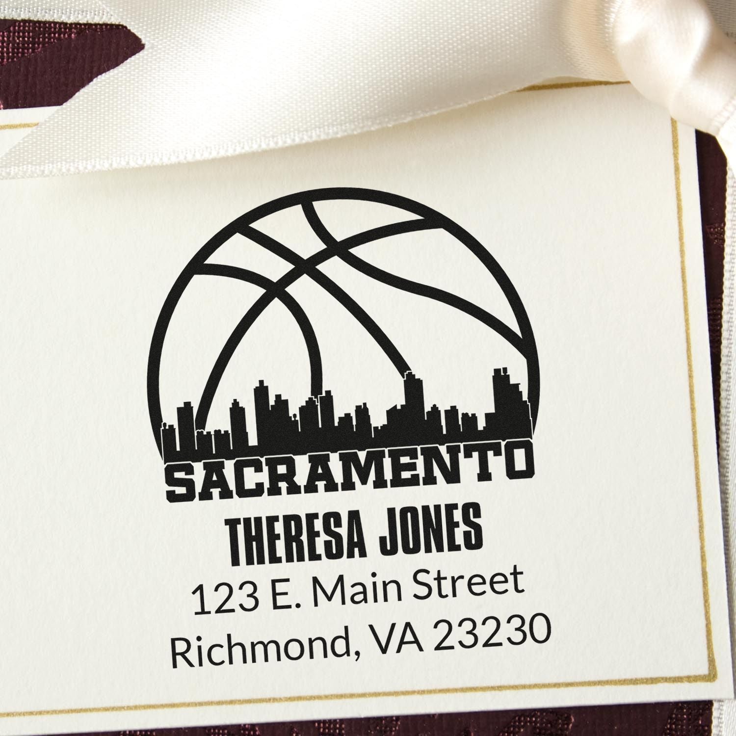 Custom Sacramento basketball skyline return address rubber stamp for Theresa Jones, 123 E. Main Street, Richmond, VA 23230.