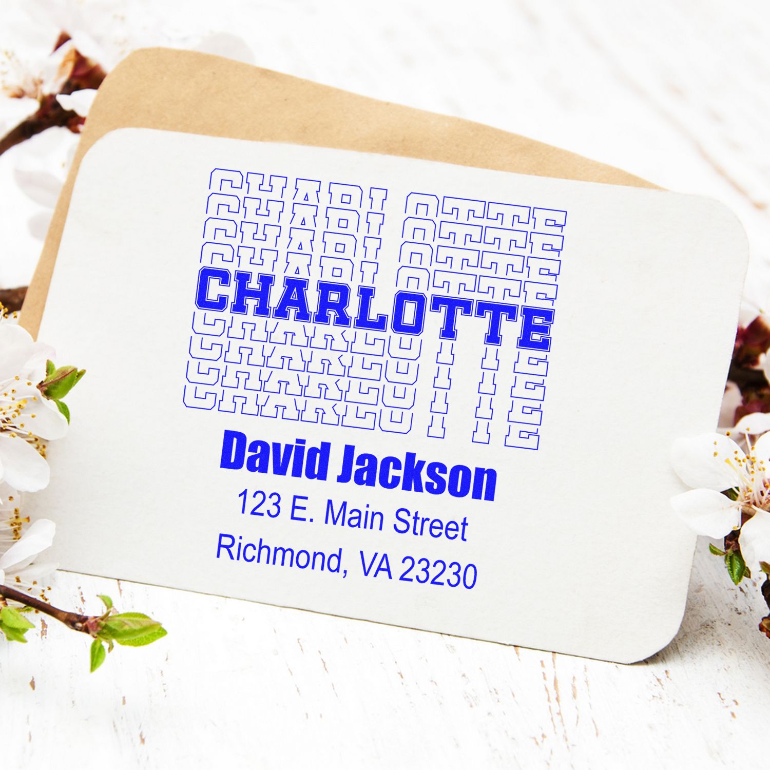 Custom rubber stamp return address design with Charlotte name and David Jackson mailing address in Richmond, VA.