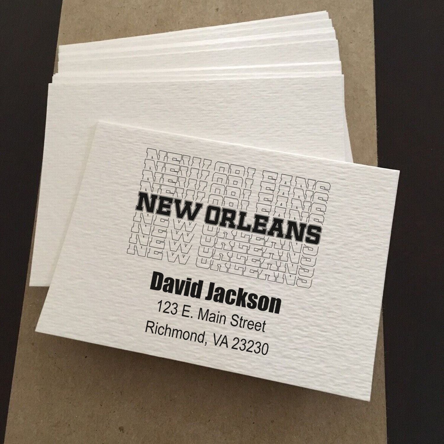 Custom rubber stamp sample for New Orleans branding with David Jackson address, Richmond, VA.