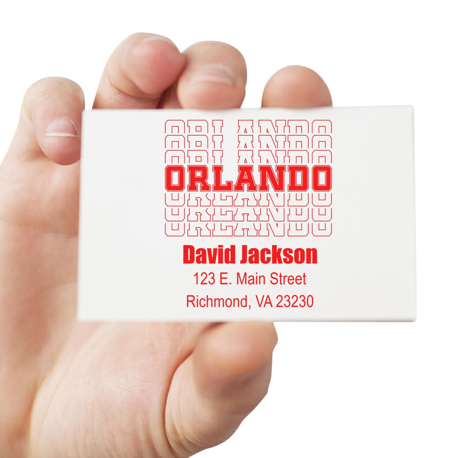 Custom Orlando address rubber stamp design held in hand, featuring David Jackson and Richmond, VA.