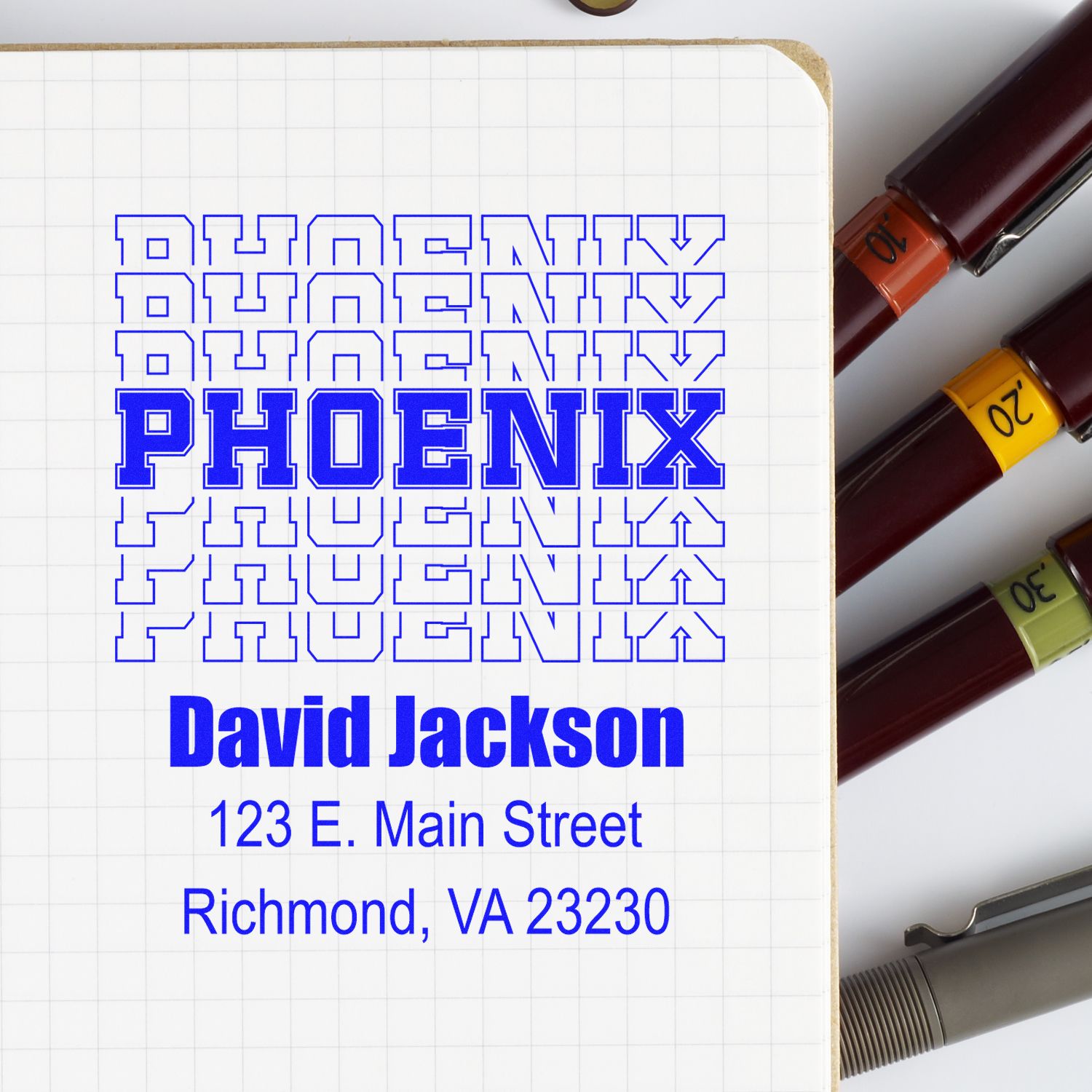 Custom rubber stamp proof for Phoenix, David Jackson, and Richmond, VA address, shown with stamp handles.