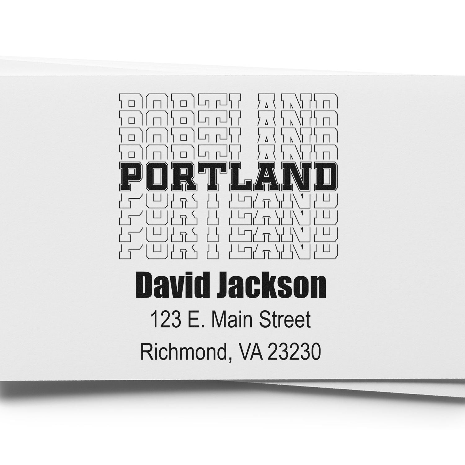 Custom Portland address rubber stamp with name and mailing details for business correspondence.