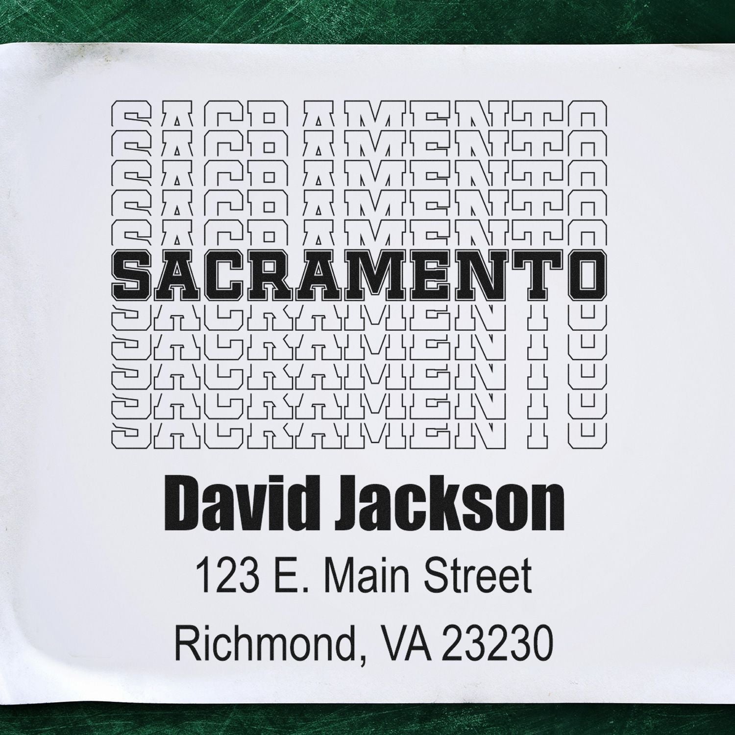 Custom rubber stamp proof for David Jackson, Sacramento design, with return address: 123 E. Main Street, Richmond, VA 23230.