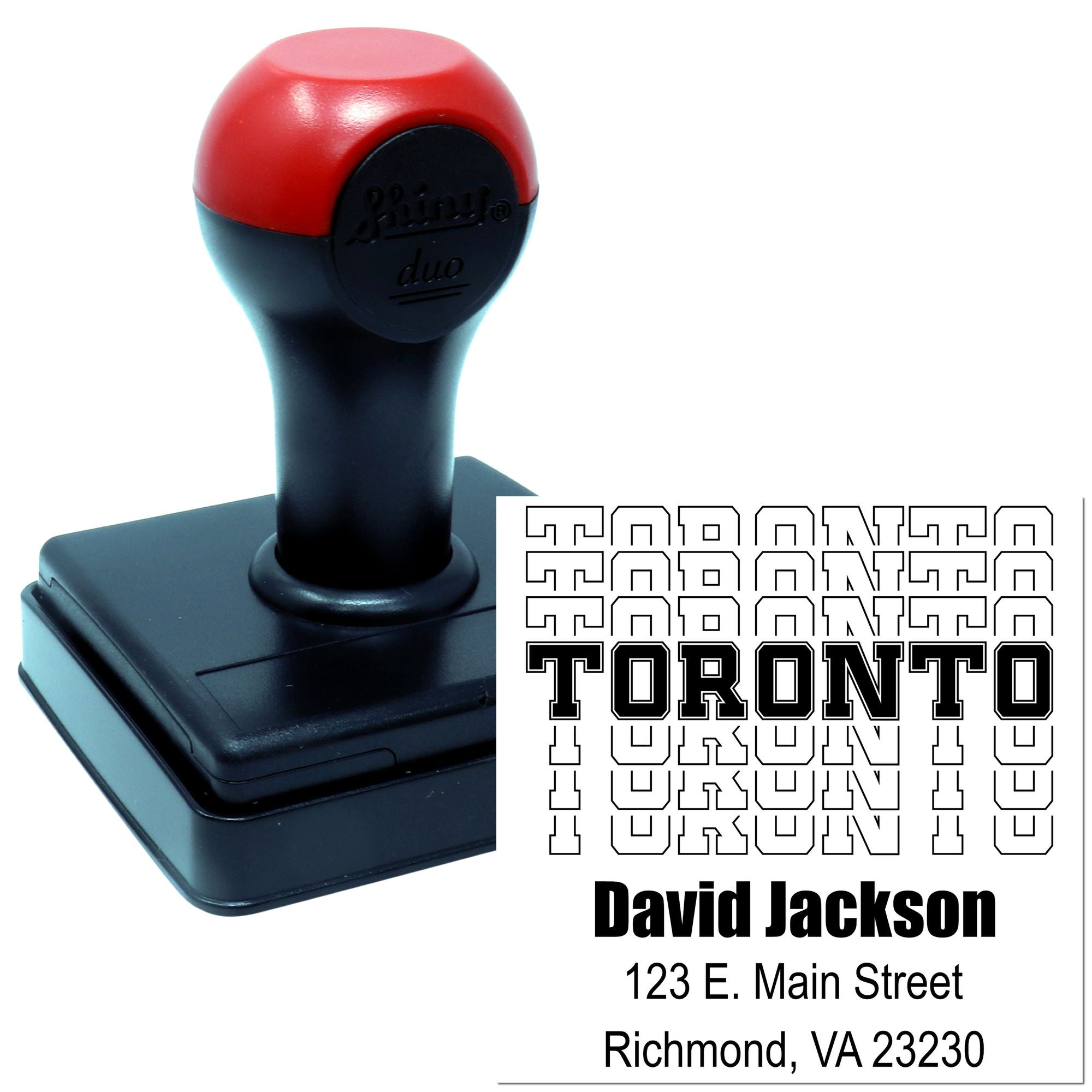 Custom self-inking rubber stamp with Toronto name and address imprint, ideal for business mailing and branding.
