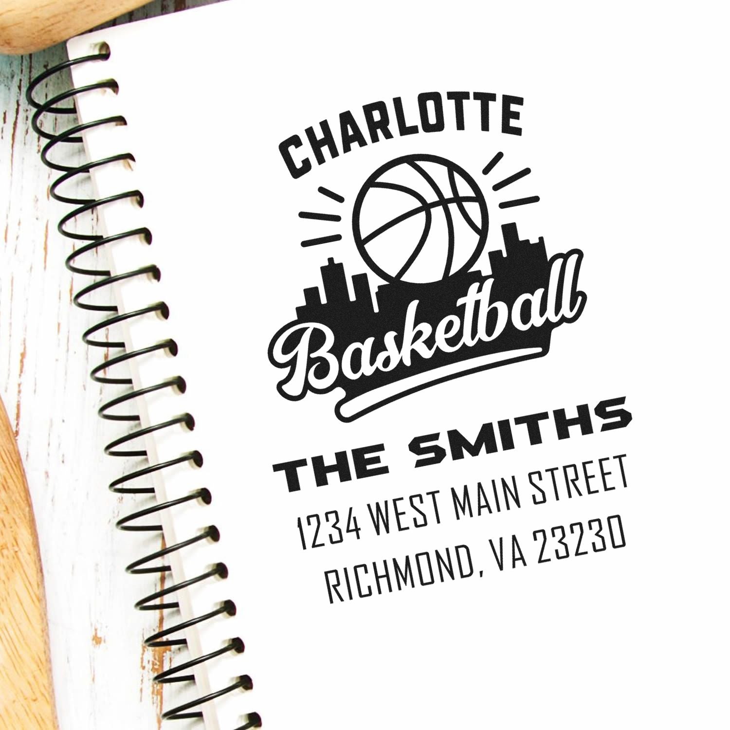 Custom Charlotte basketball return address rubber stamp with family name and address, ideal for sports-themed stationery.