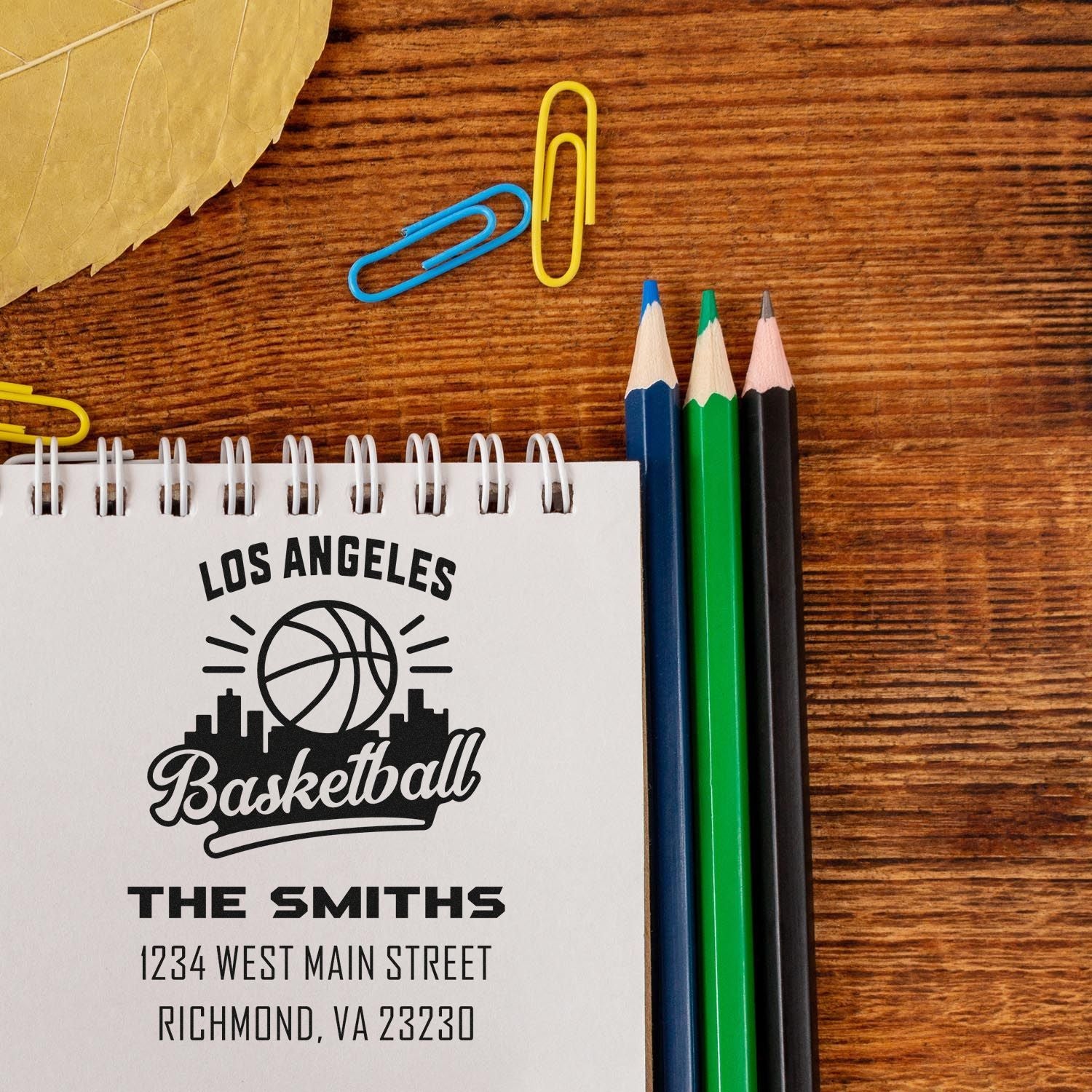 Personalized basketball rubber stamp for custom address stationery featuring Los Angeles design and family name.