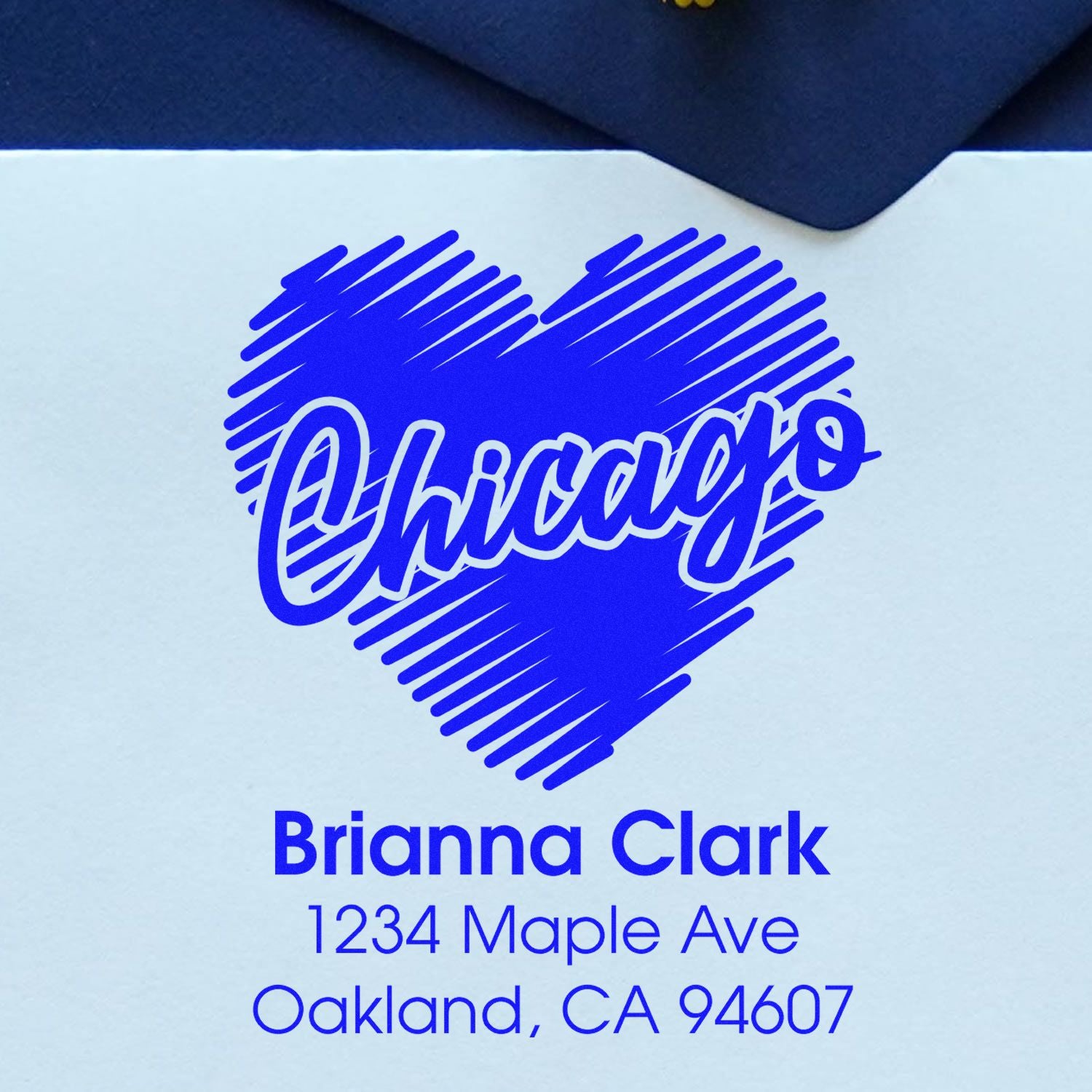 Custom Chicago heart return address rubber stamp for Brianna Clark, 1234 Maple Ave, Oakland, CA 94607.