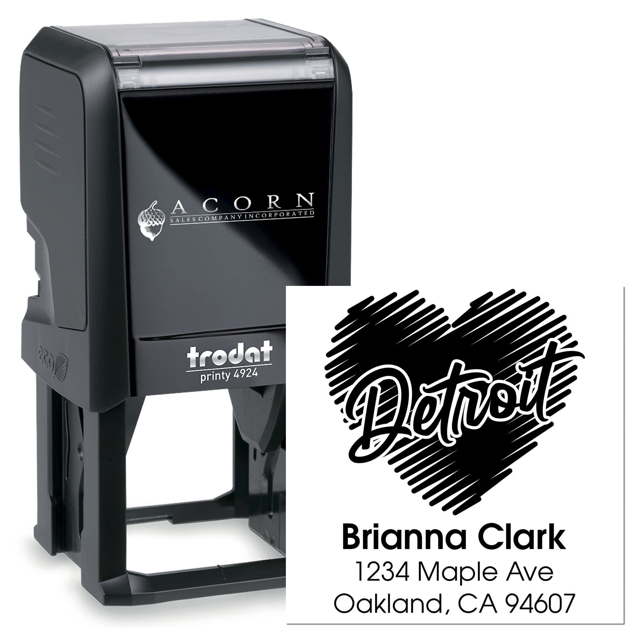 Personalized self-inking return address stamp with custom logo, name, and Oakland, CA address for business mail.