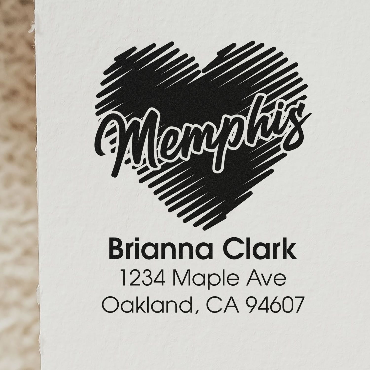 Custom Memphis heart return address rubber stamp for Brianna Clark, Oakland, CA 94607.