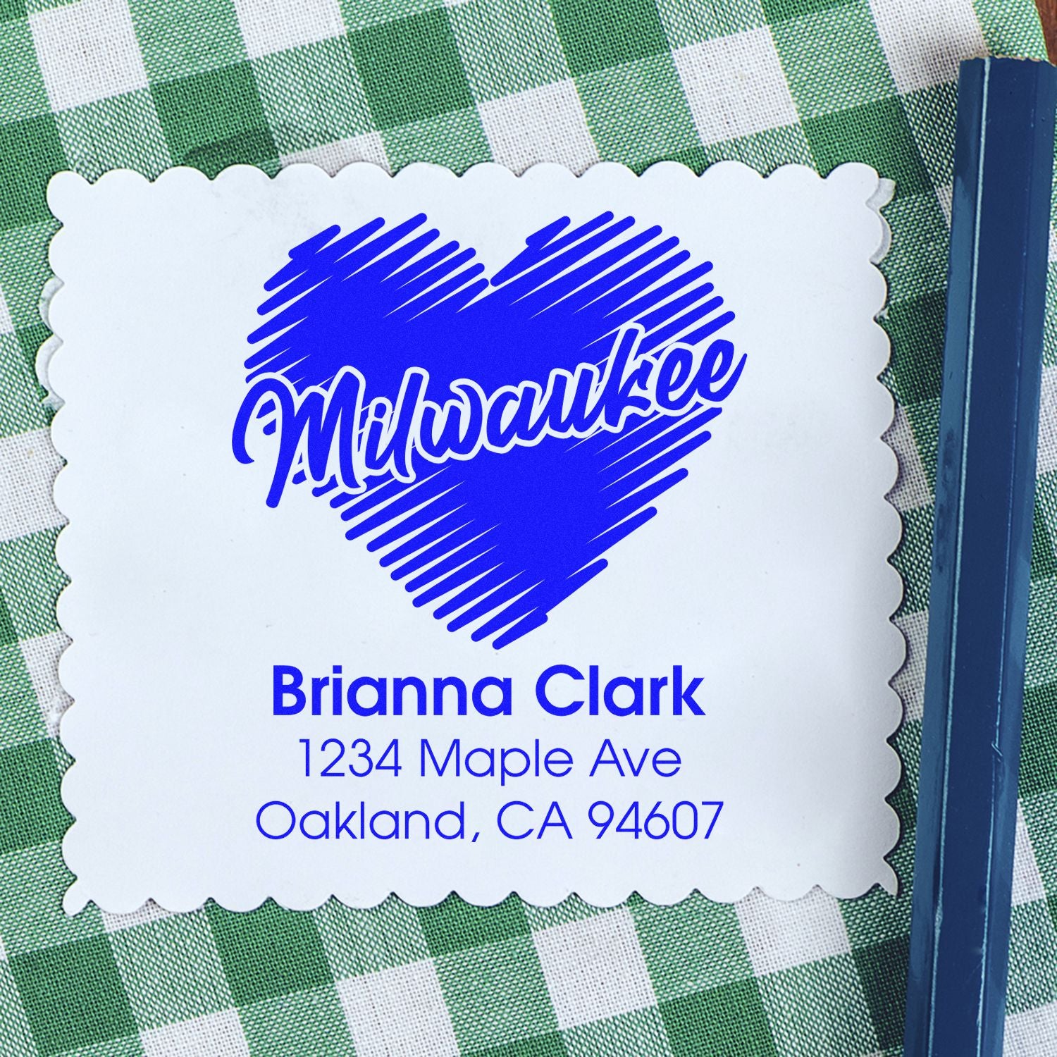 Personalized Milwaukee return address rubber stamp with heart logo, Brianna Clark name, and Oakland, CA address.