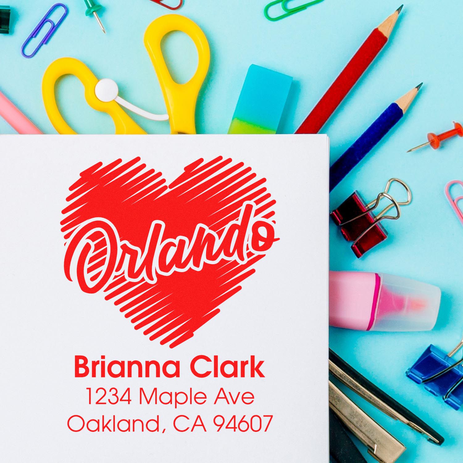 Personalized rubber return address stamp with heart design for Brianna Clark, Oakland, CA mail and stationery.