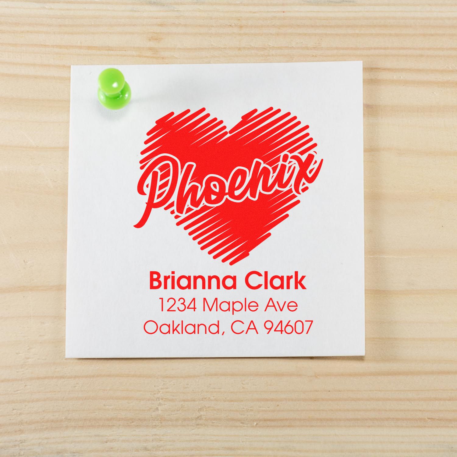 Personalized return address rubber stamp with heart design for Brianna Clark, Oakland, CA mail and wedding stationery.