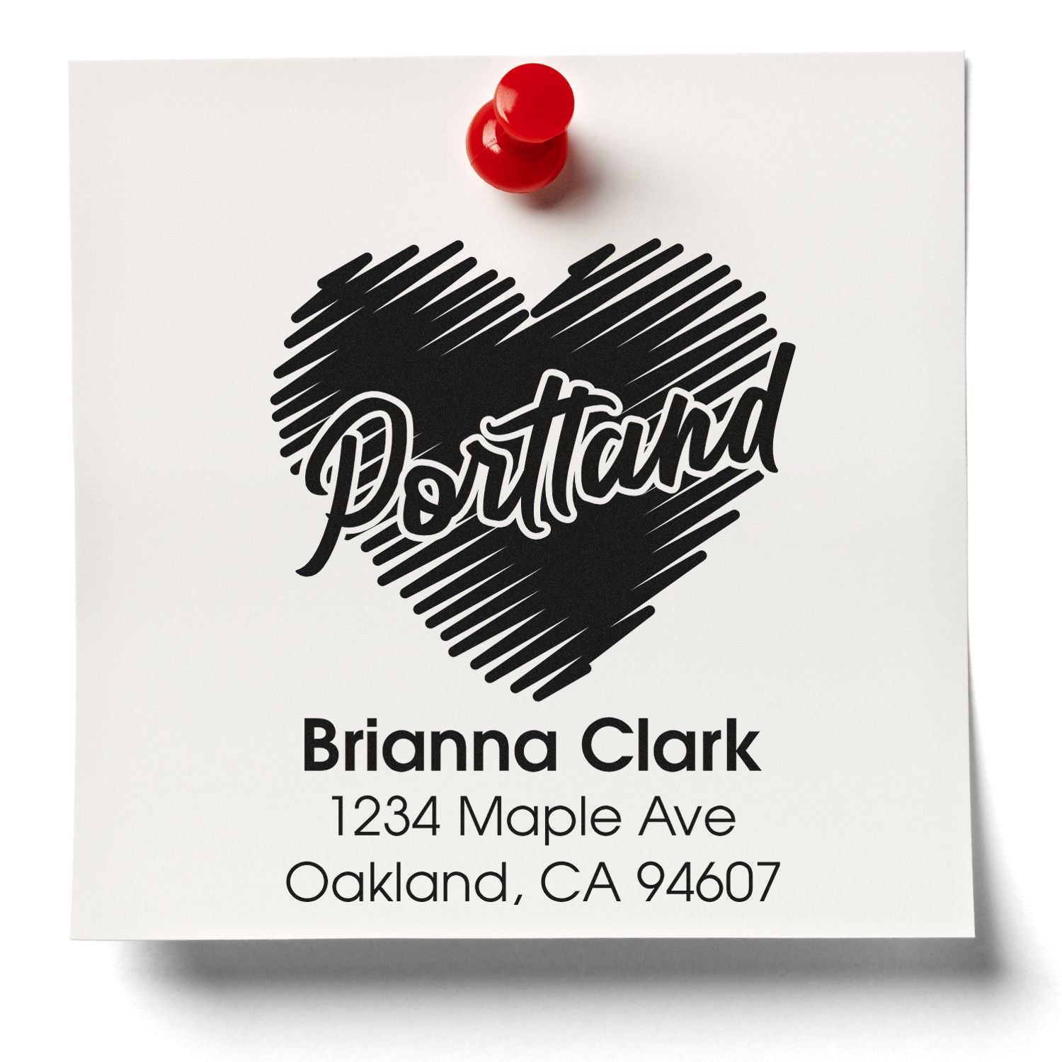 Custom return address rubber stamp with Portland heart design and Brianna Clarks Oakland, CA 94607 address.