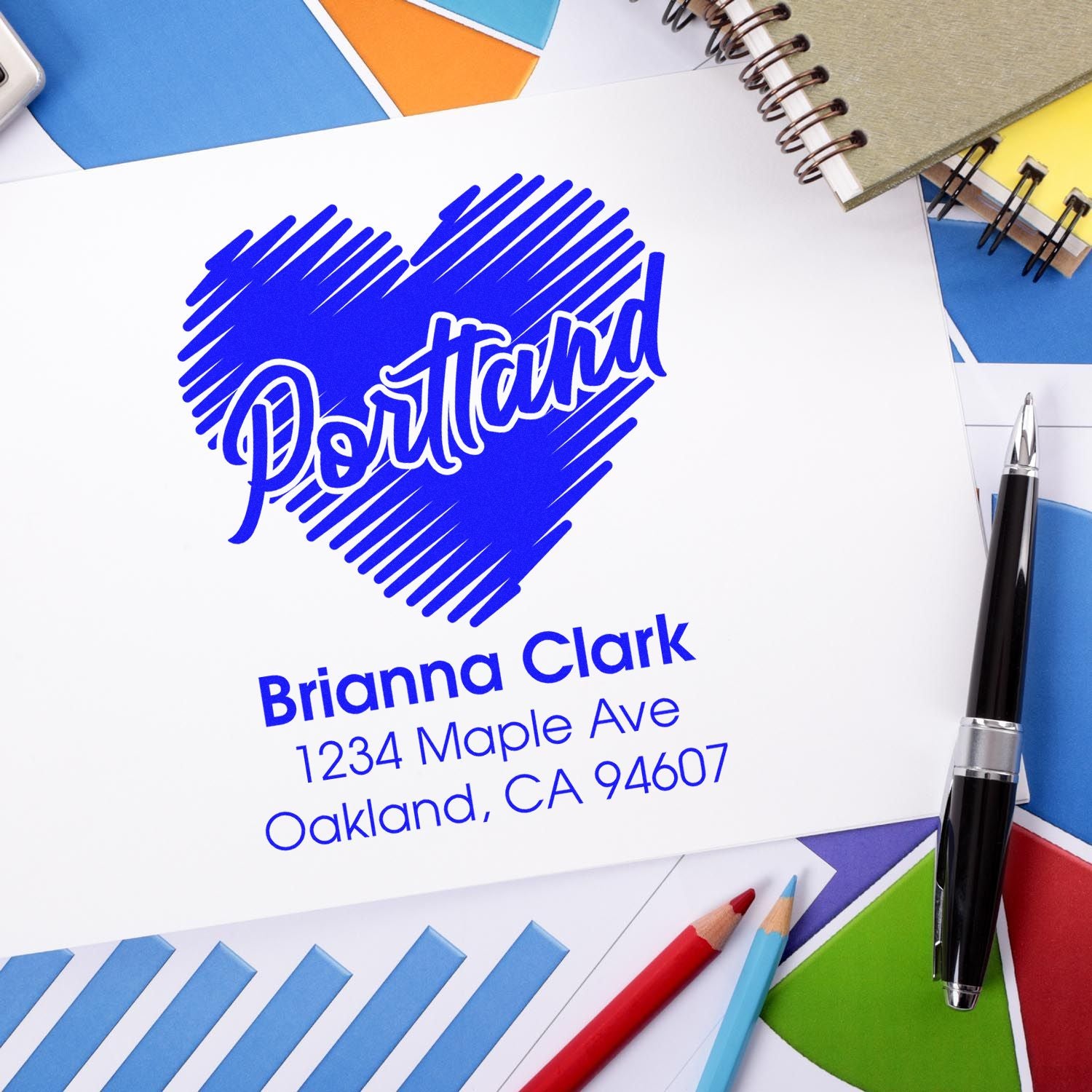Custom heart-shaped return address rubber stamp with Brianna Clark name and Oakland, CA mailing details.