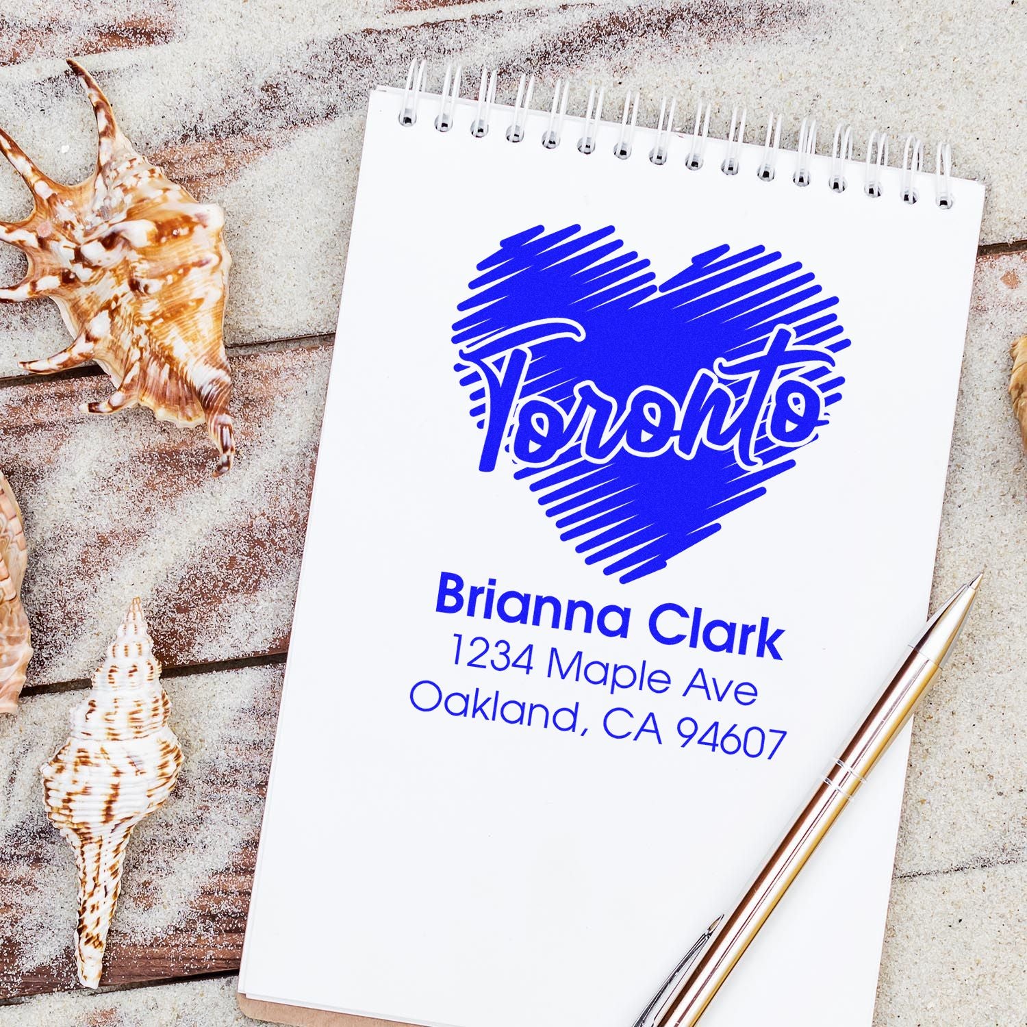 Custom Toronto return address rubber stamp with Brianna Clark name and Oakland, CA mailing address for personalized stationery.