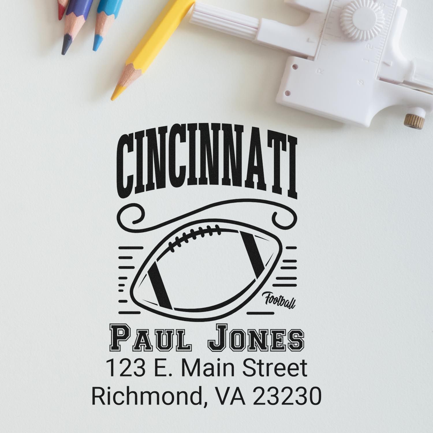 Custom Cincinnati football return address rubber stamp with Paul Jones, Richmond, VA 23230