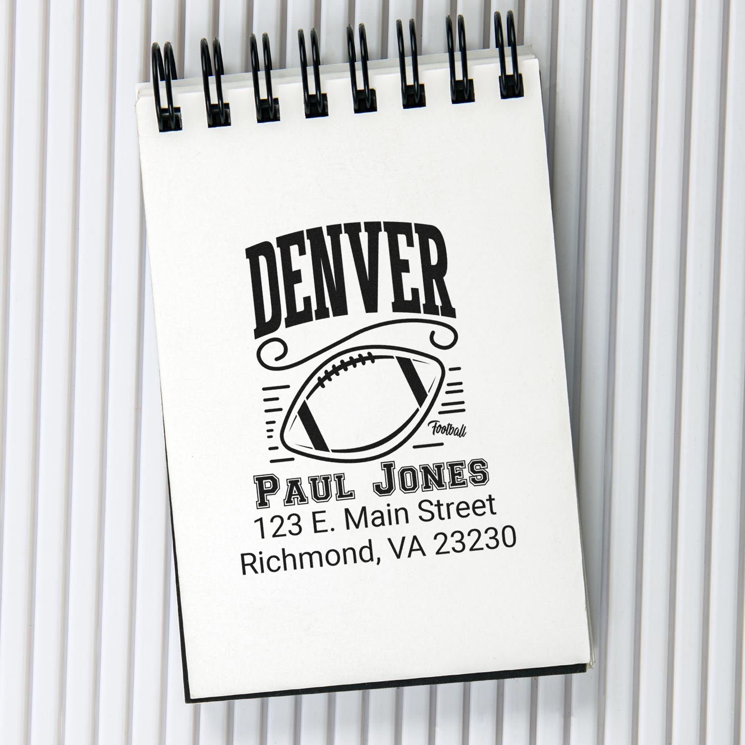 Personalized Denver football address rubber stamp with name, street address, and city for custom mailing labels.