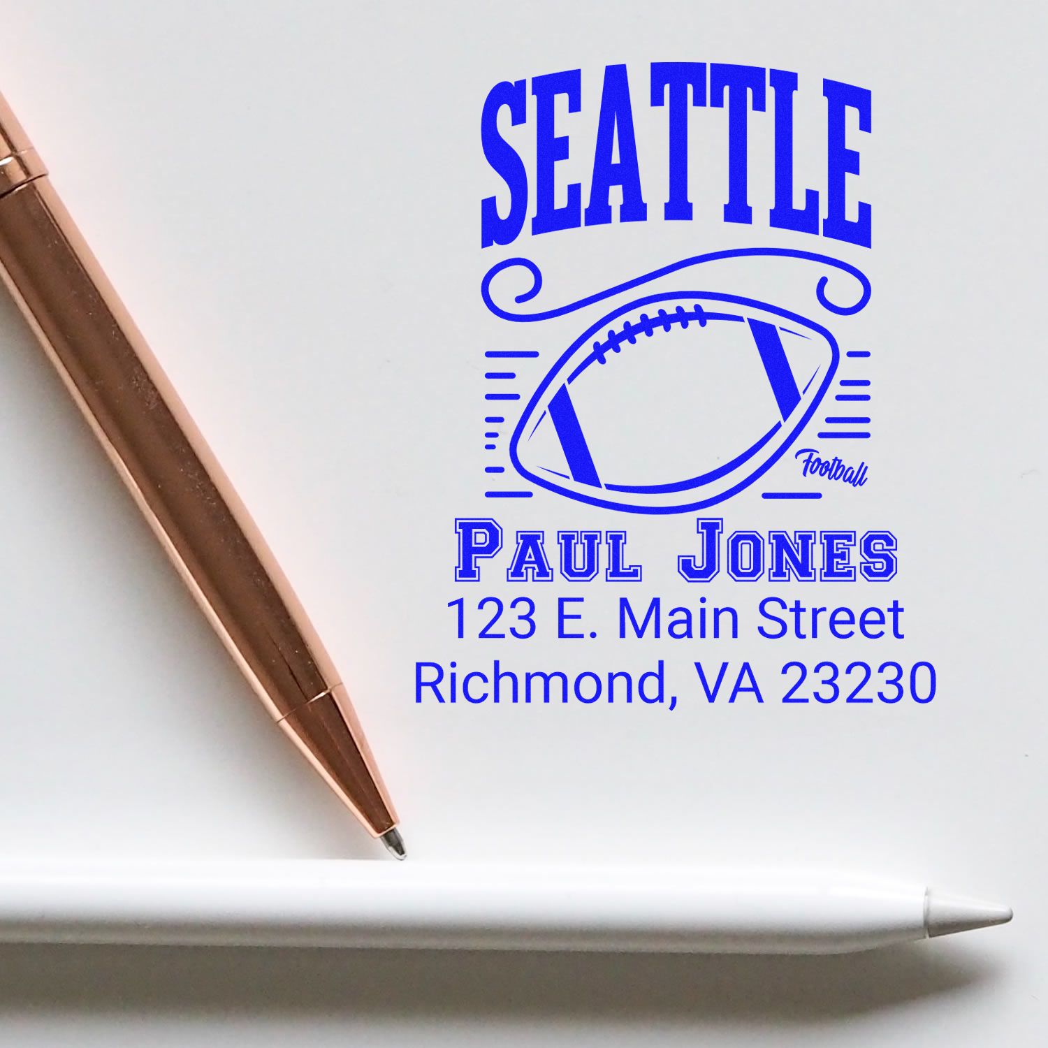 Custom Seattle football rubber stamp with football graphic, Paul Jones name, and Richmond, VA return address.