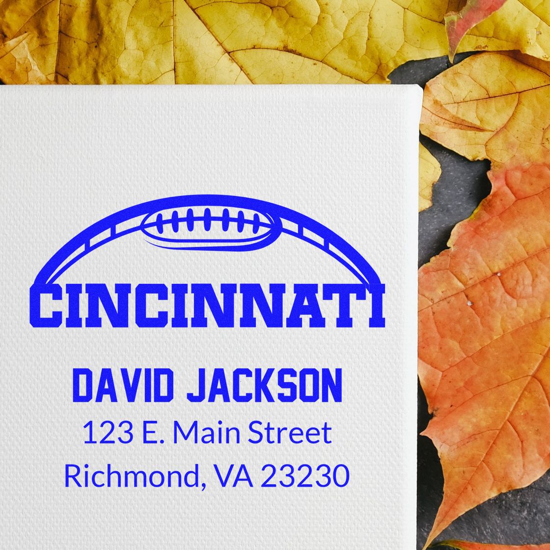 Custom Cincinnati football address stamp for David Jackson, 123 E. Main Street, Richmond, VA 23230.