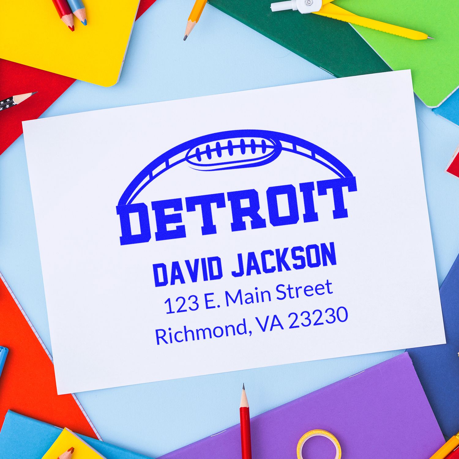 Custom Detroit rubber stamp with football logo, name, and address for personalized mailing and sports branding.