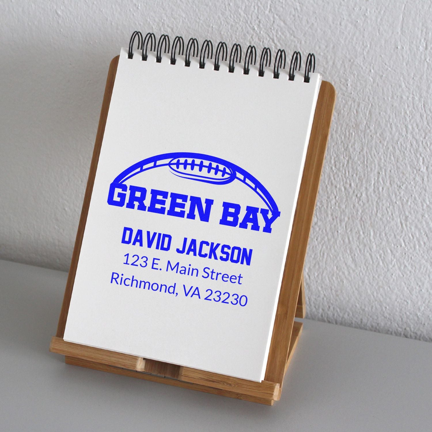 Custom football address rubber stamp impression on notepad with Green Bay, David Jackson, and Richmond, VA address.