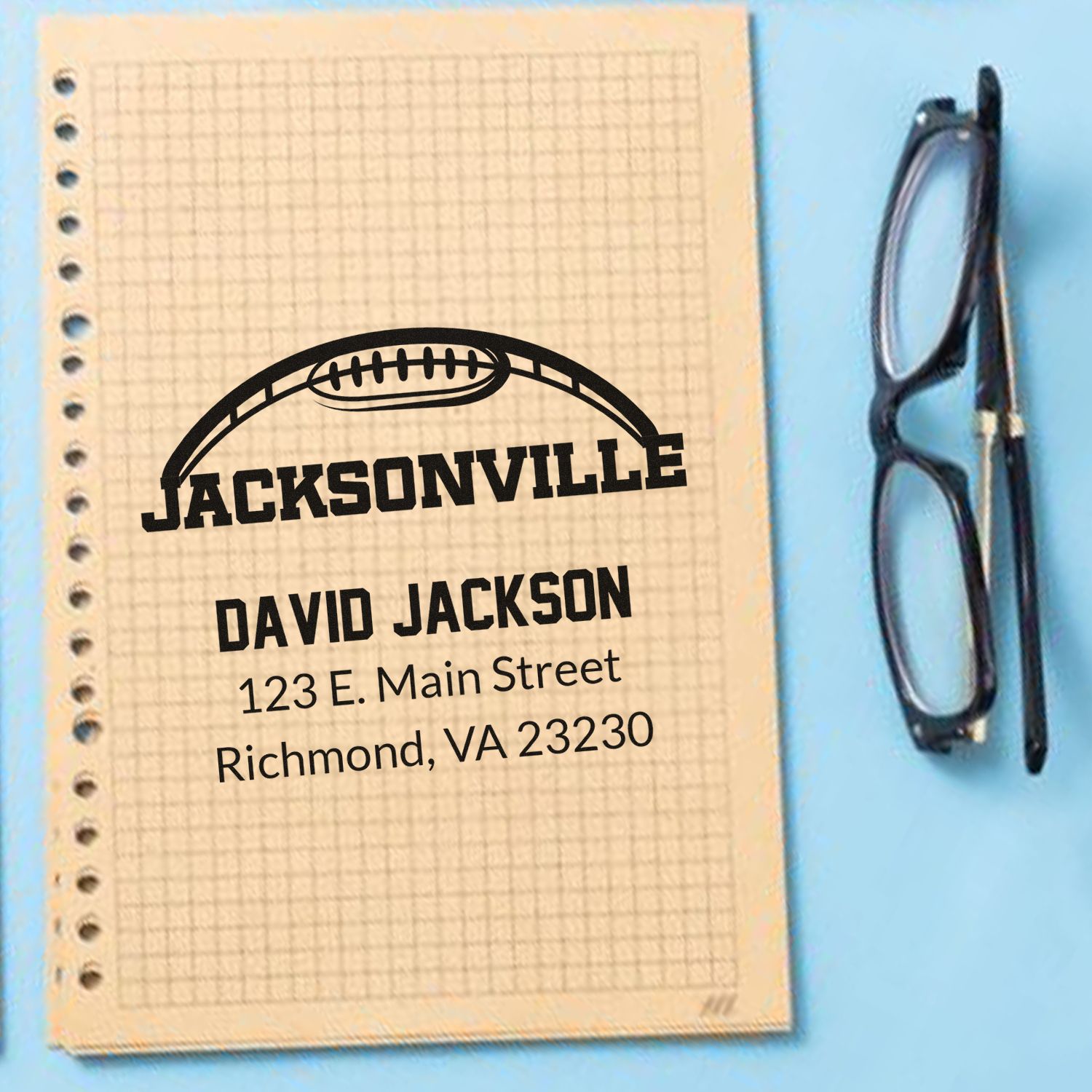 Personalized football-themed rubber address stamp for David Jackson, with Jacksonville and Richmond, VA 23230.